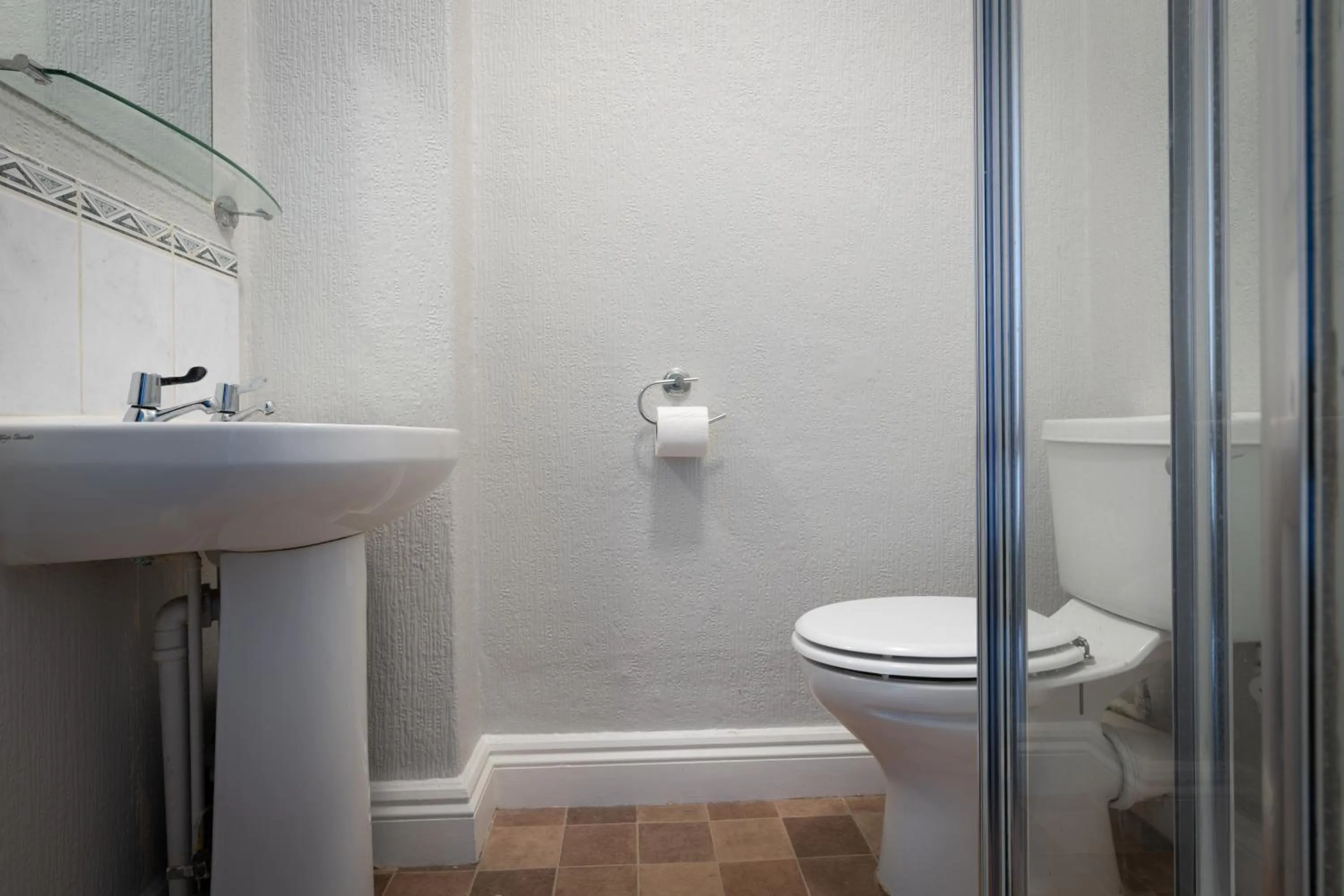 Shower in Coasters Holiday Apartments