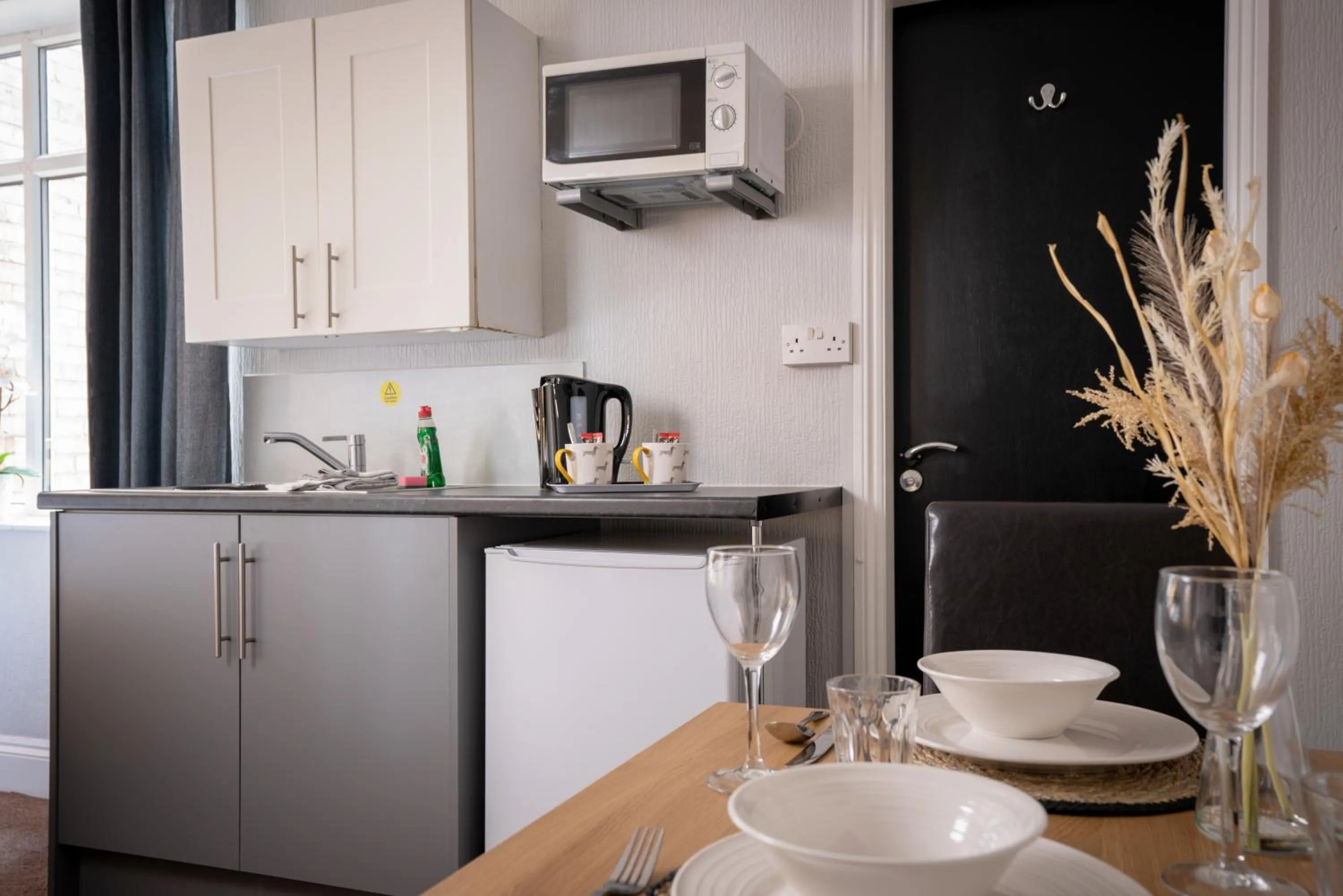 Kitchen or kitchenette in Coasters Holiday Apartments
