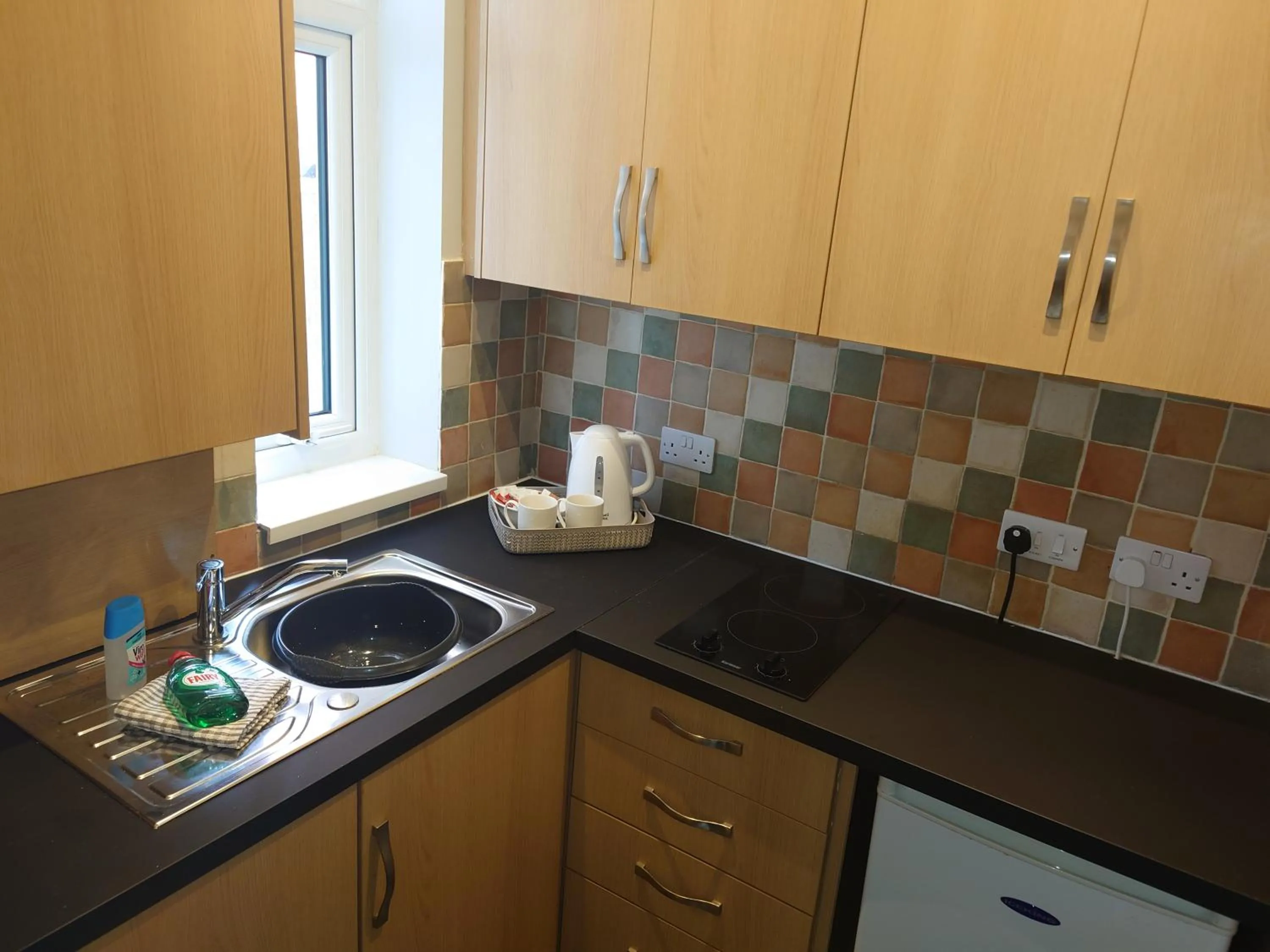 Kitchen or kitchenette in Coasters Holiday Apartments
