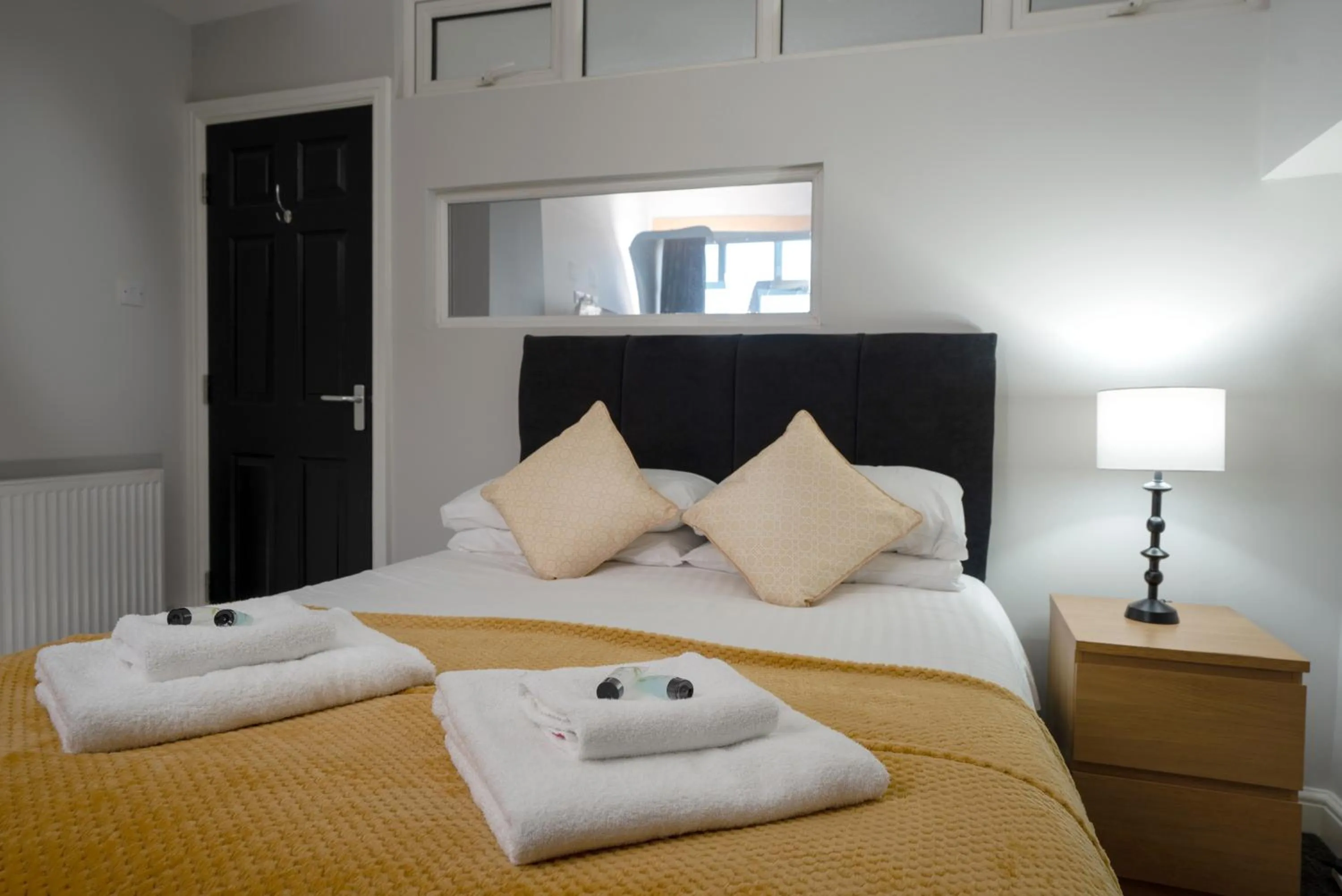 Bed in Coasters Holiday Apartments