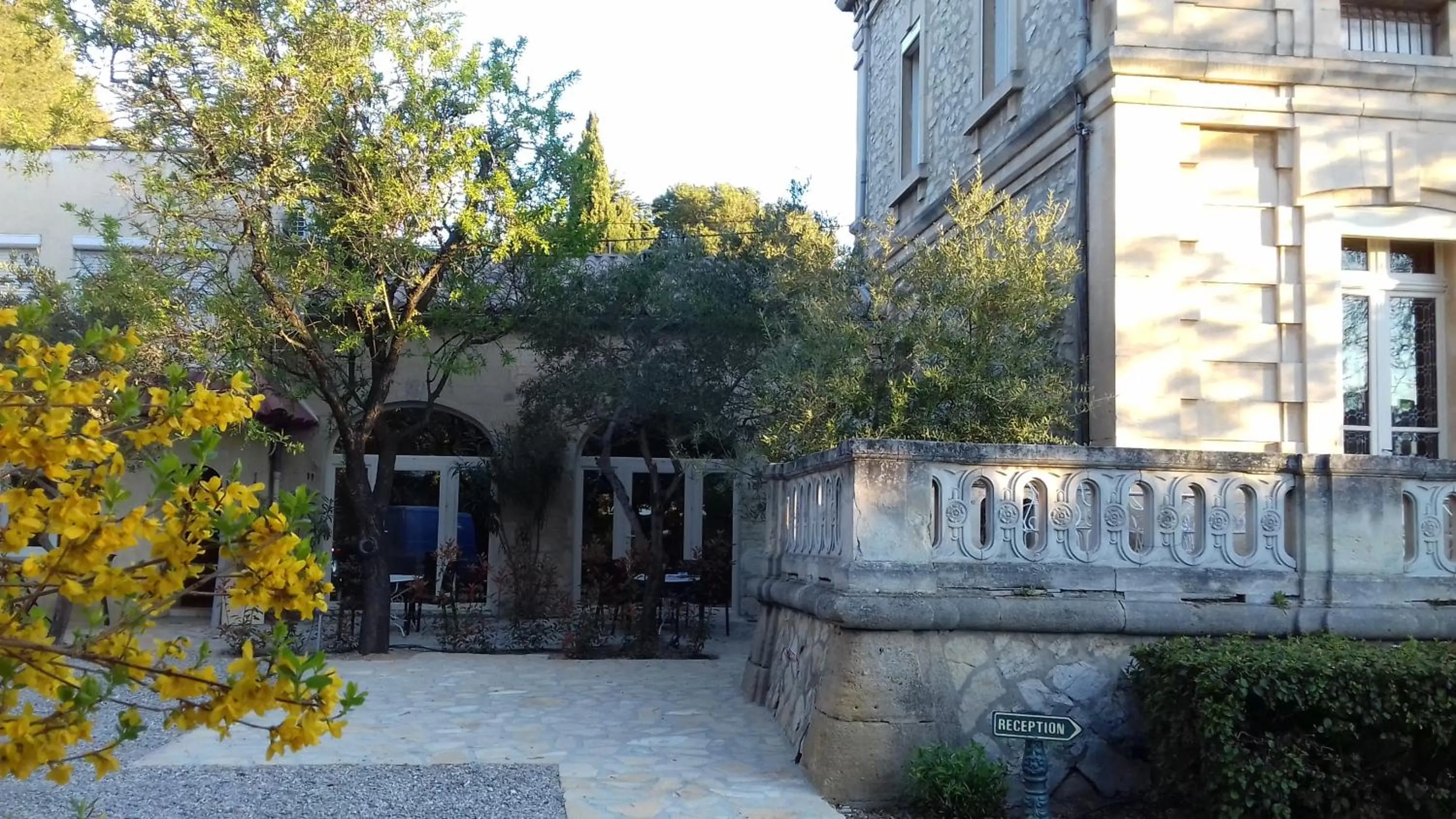 Garden in Logis Hôtel - Restaurant Résidence Les Cèdres
