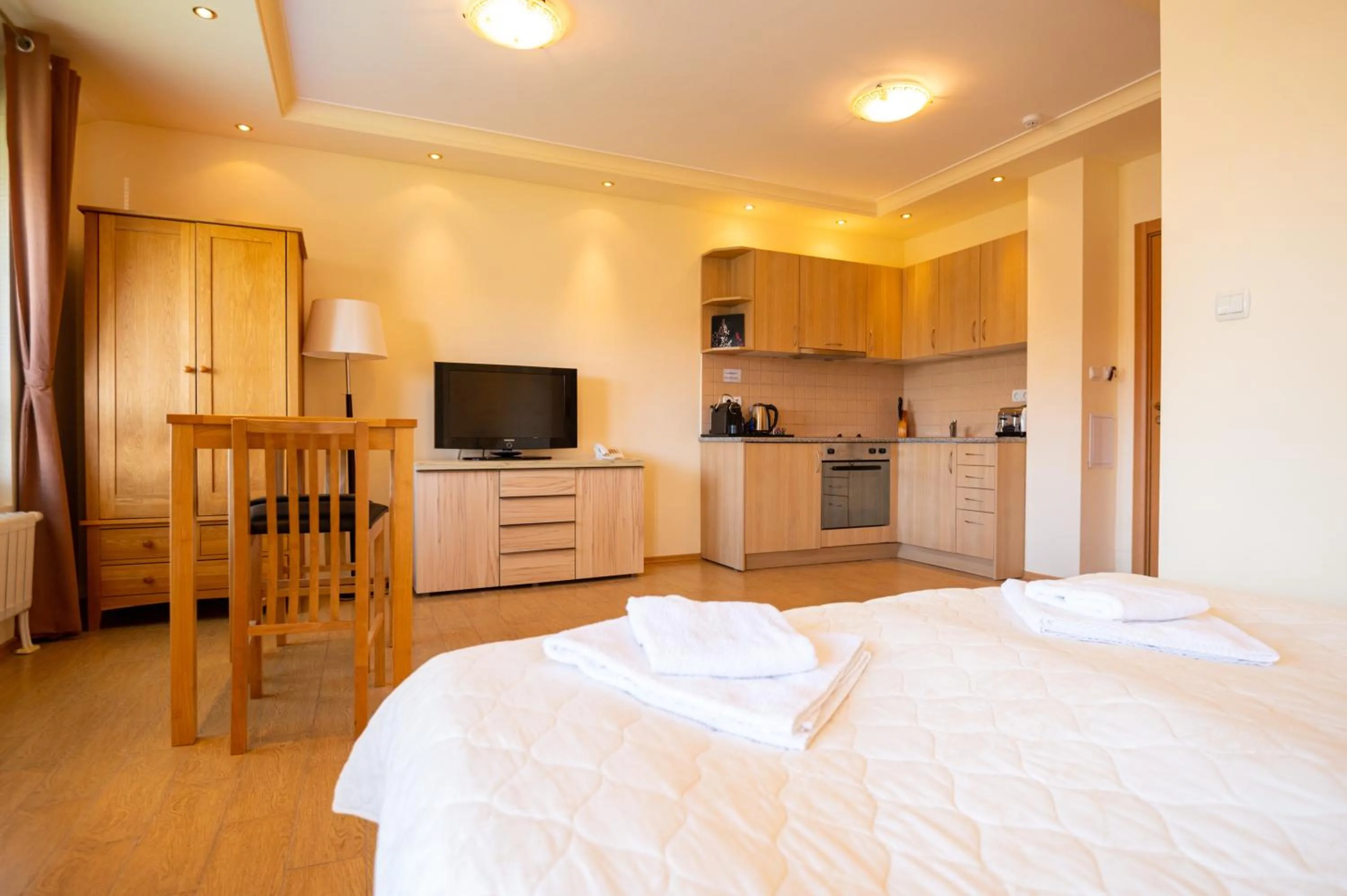 Bed in Parklands Hotel & Pool