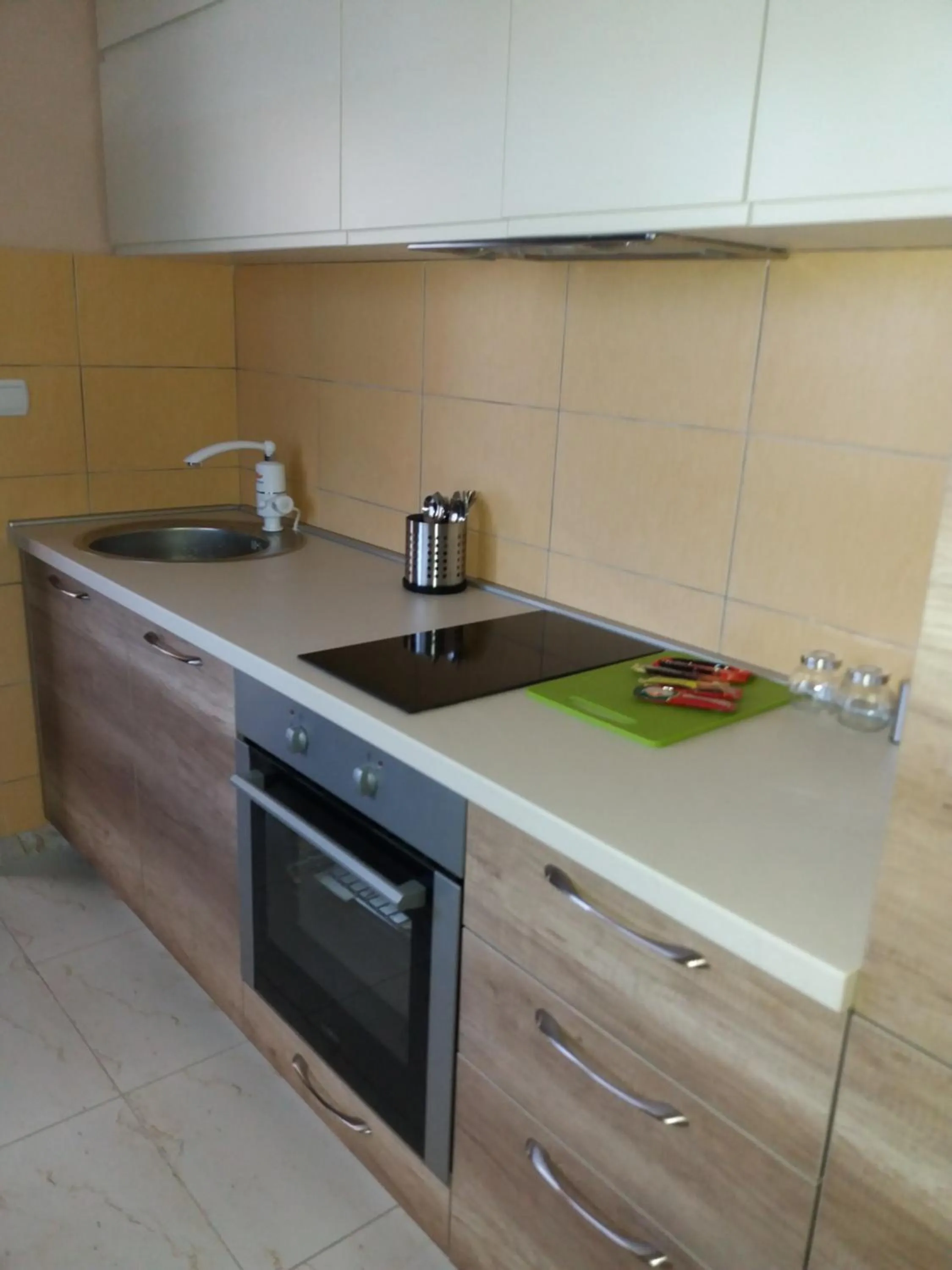 Kitchen or kitchenette in Apartments Grande House