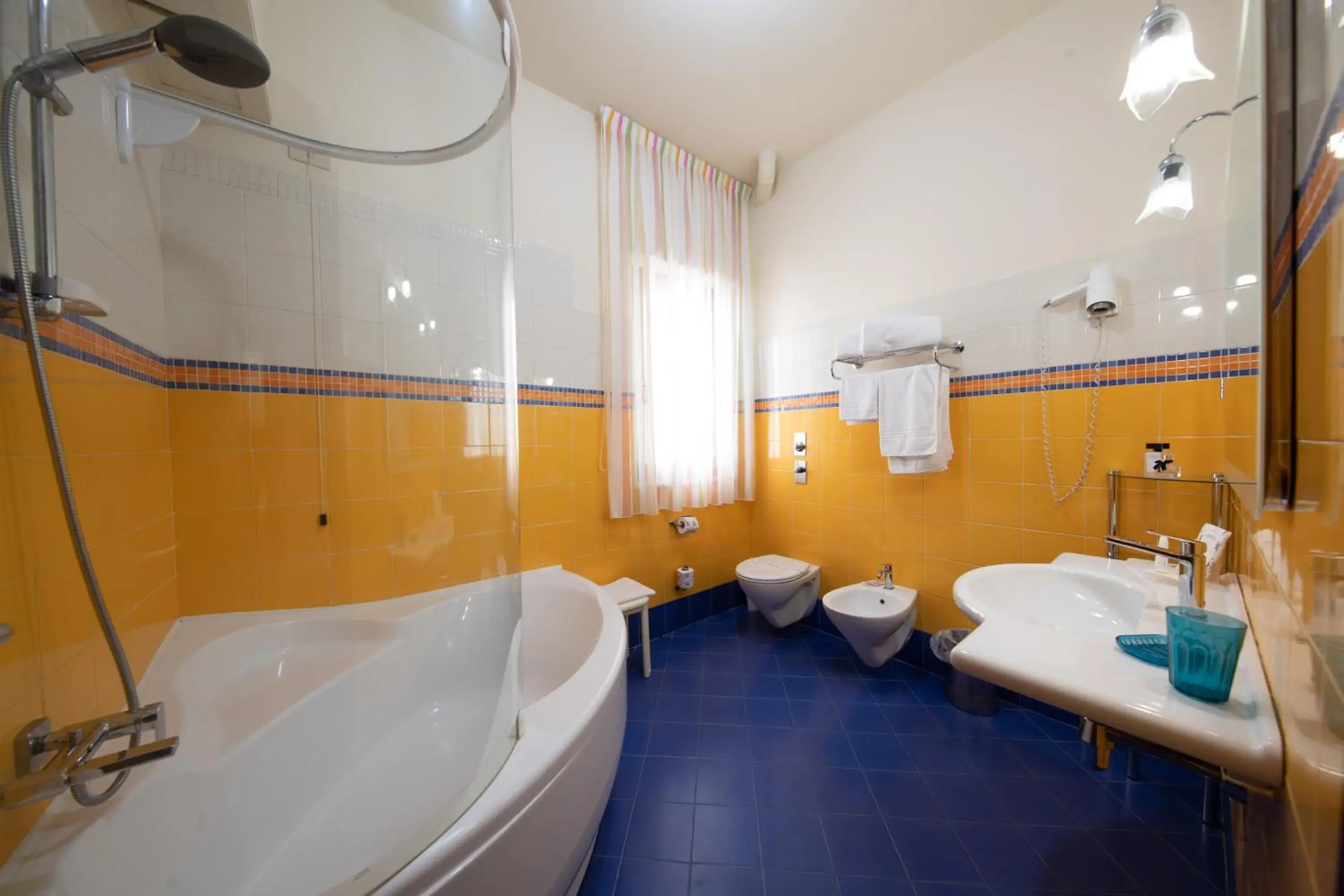 Triple Room with Sea View in Hotel Riva Del Sole Triple Room with Sea View in Hotel Riva Del Sole