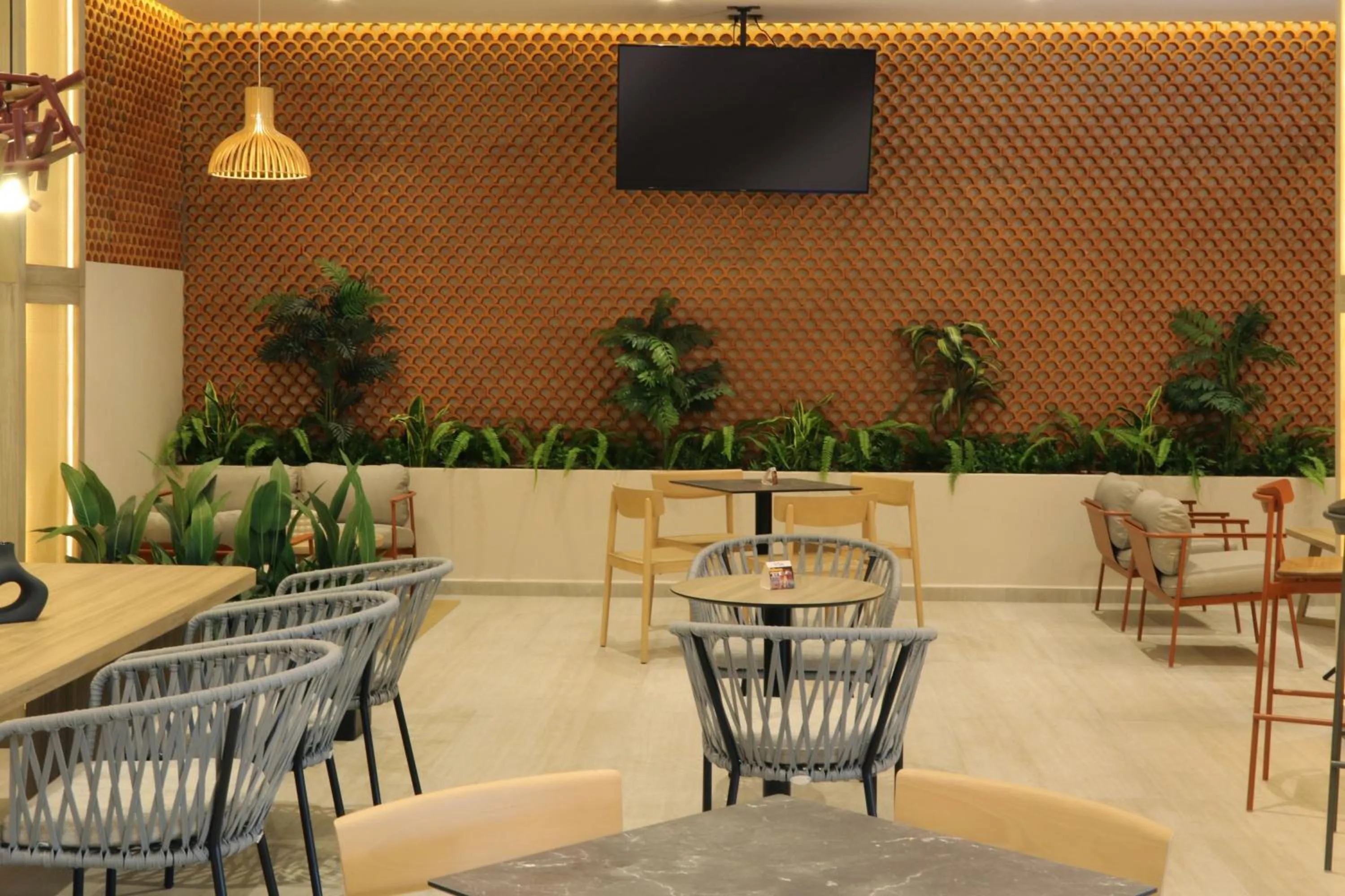 Lounge or bar in City Express Plus by Marriott Puerto Vallarta