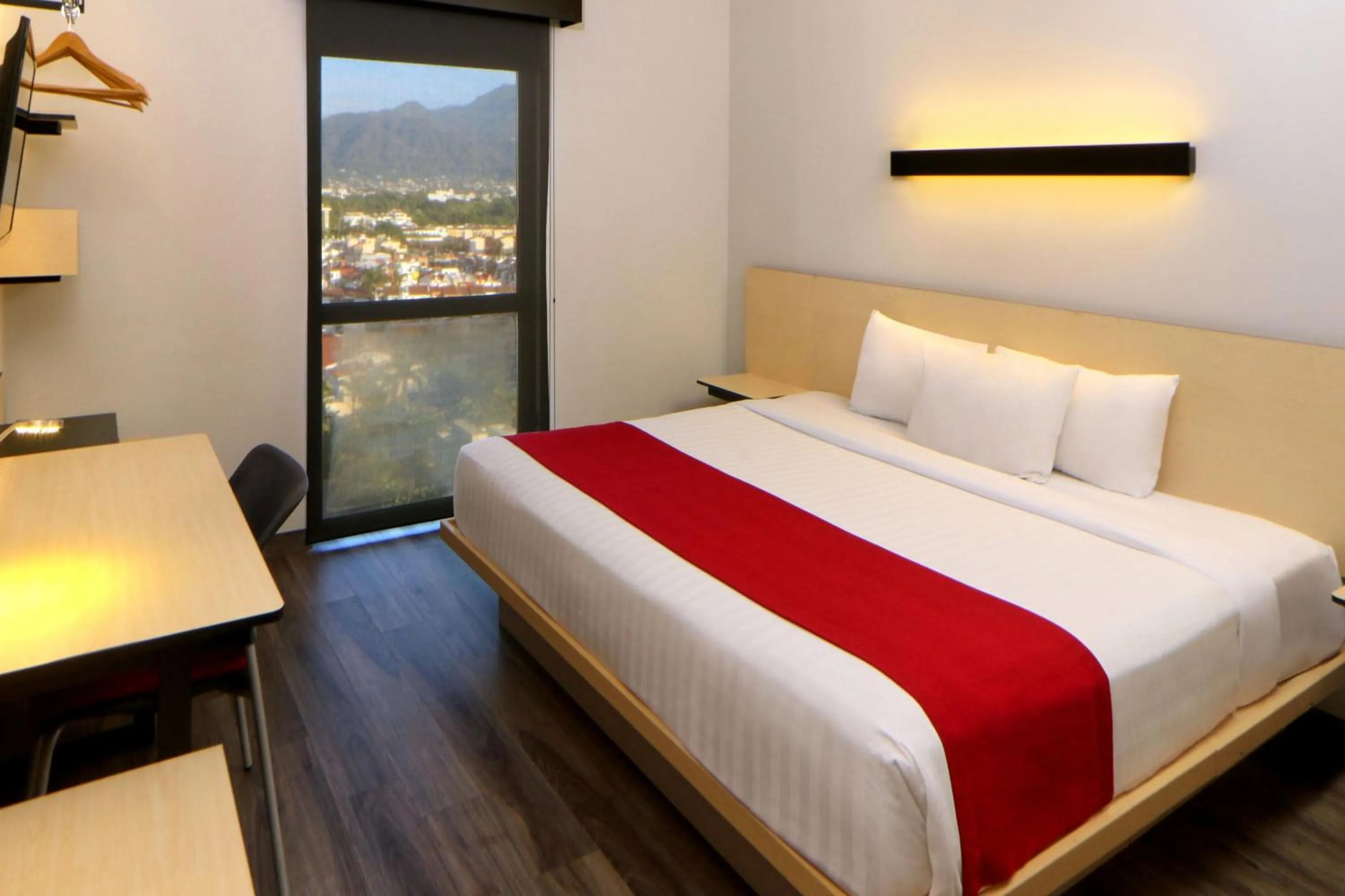 Photo of the whole room, Bed in City Express Plus by Marriott Puerto Vallarta