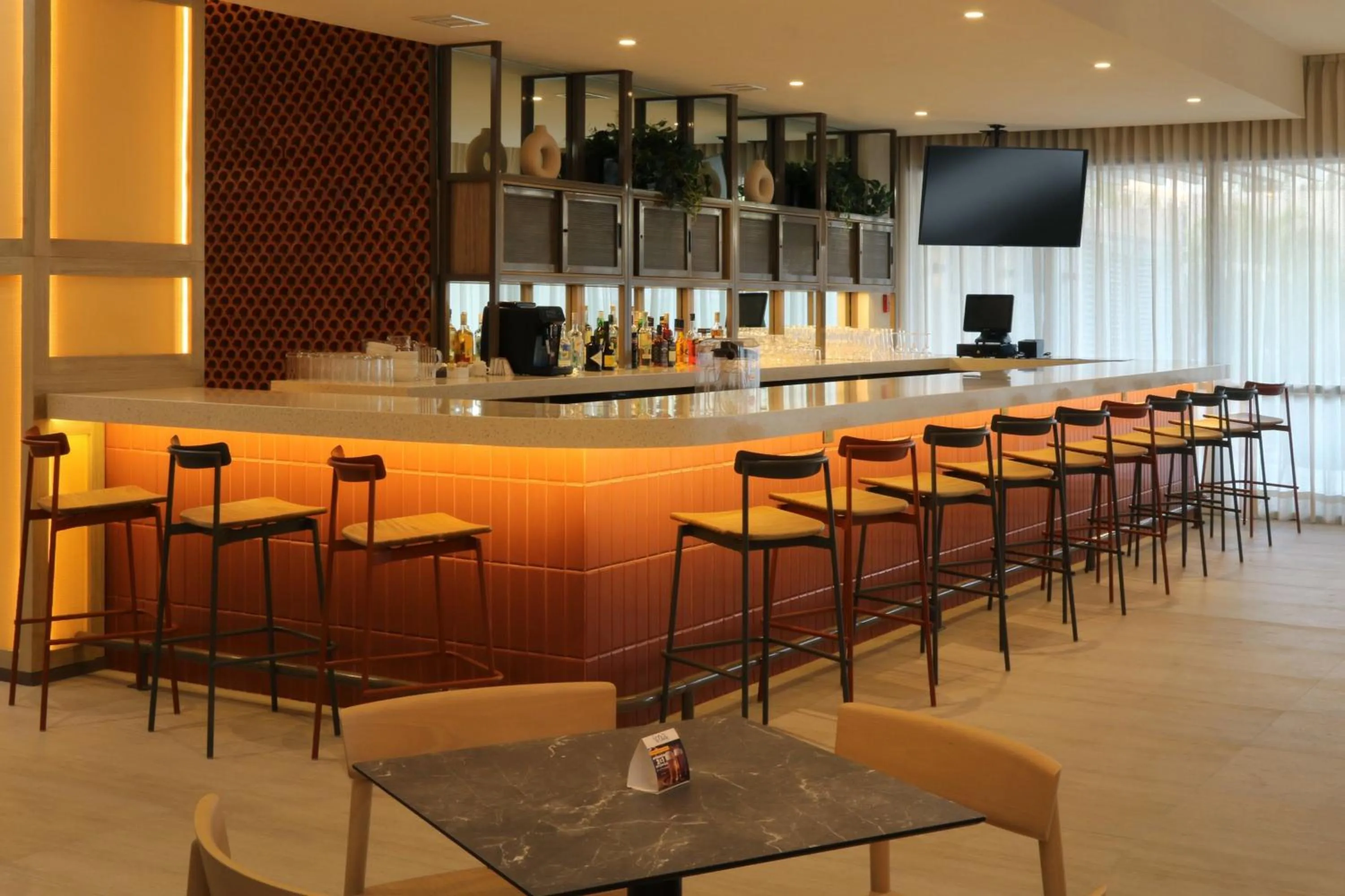 Lounge or bar in City Express Plus by Marriott Puerto Vallarta
