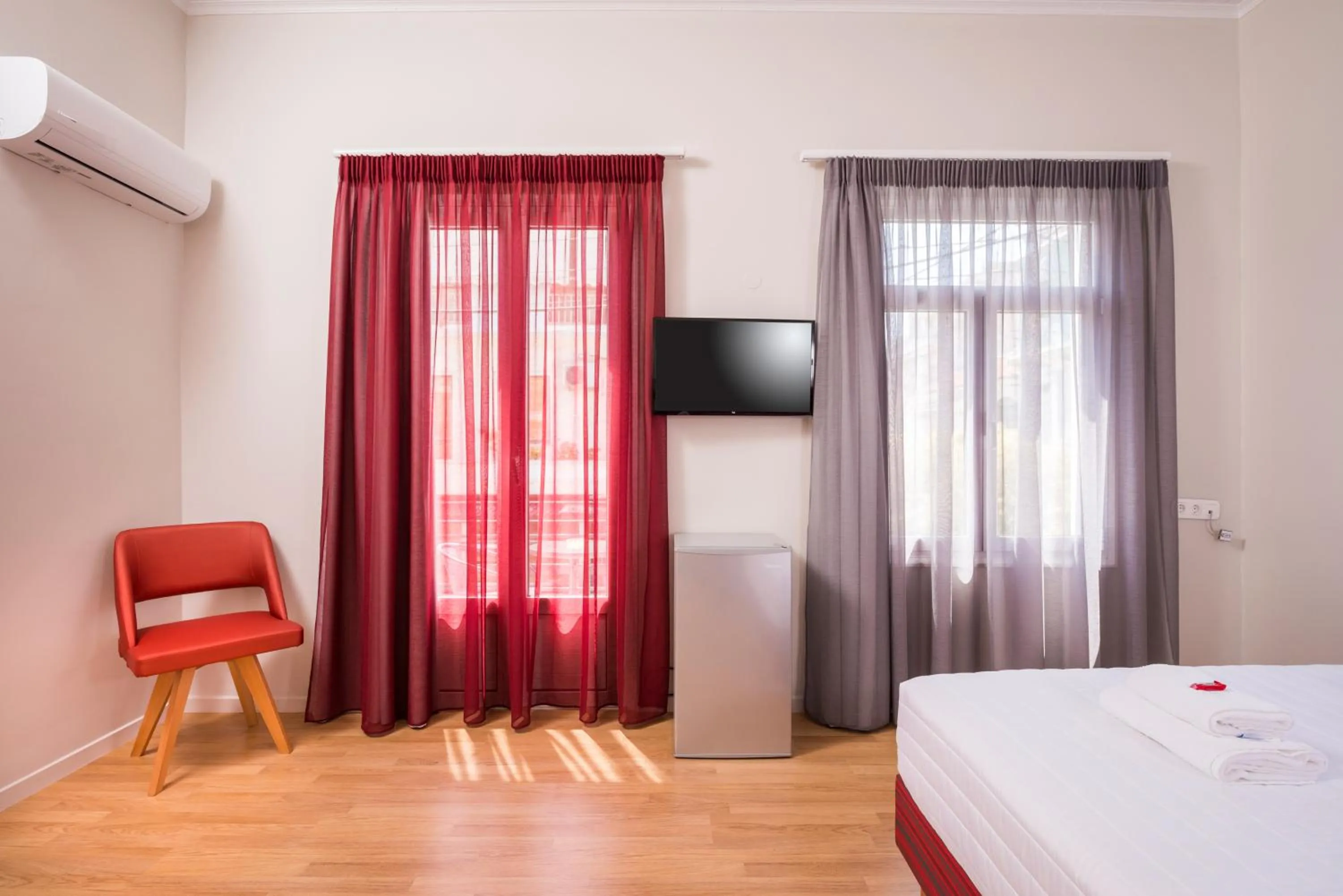 Bed in TheJoy City Suites