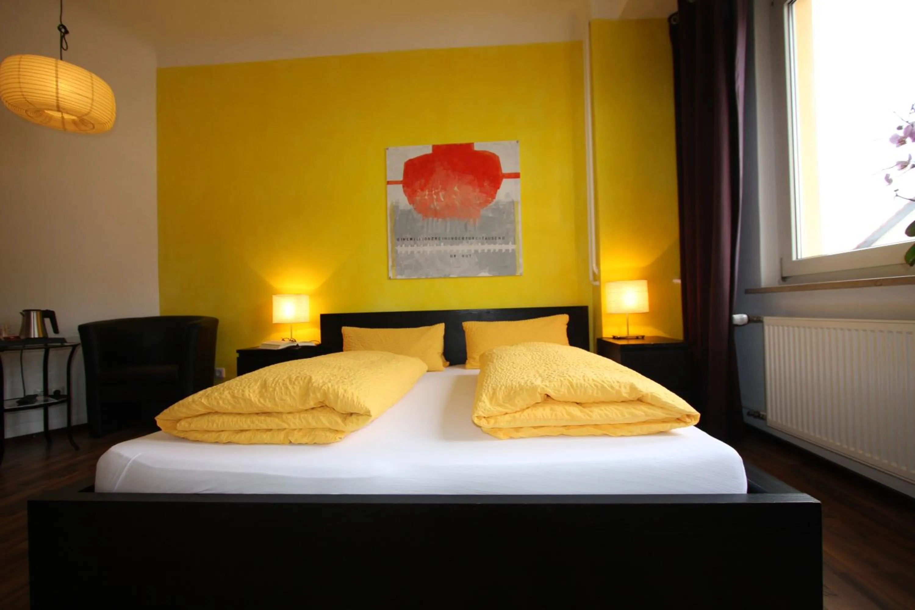 Photo of the whole room, Bed in Stadthotel Kleiner Berg