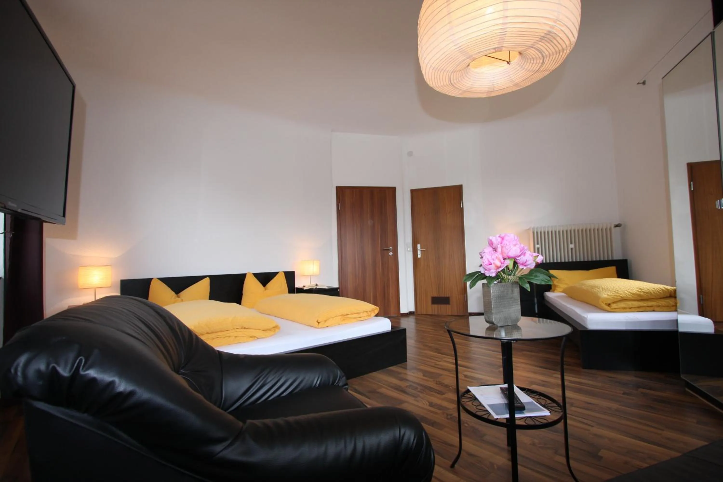 Photo of the whole room, Bed in Stadthotel Kleiner Berg