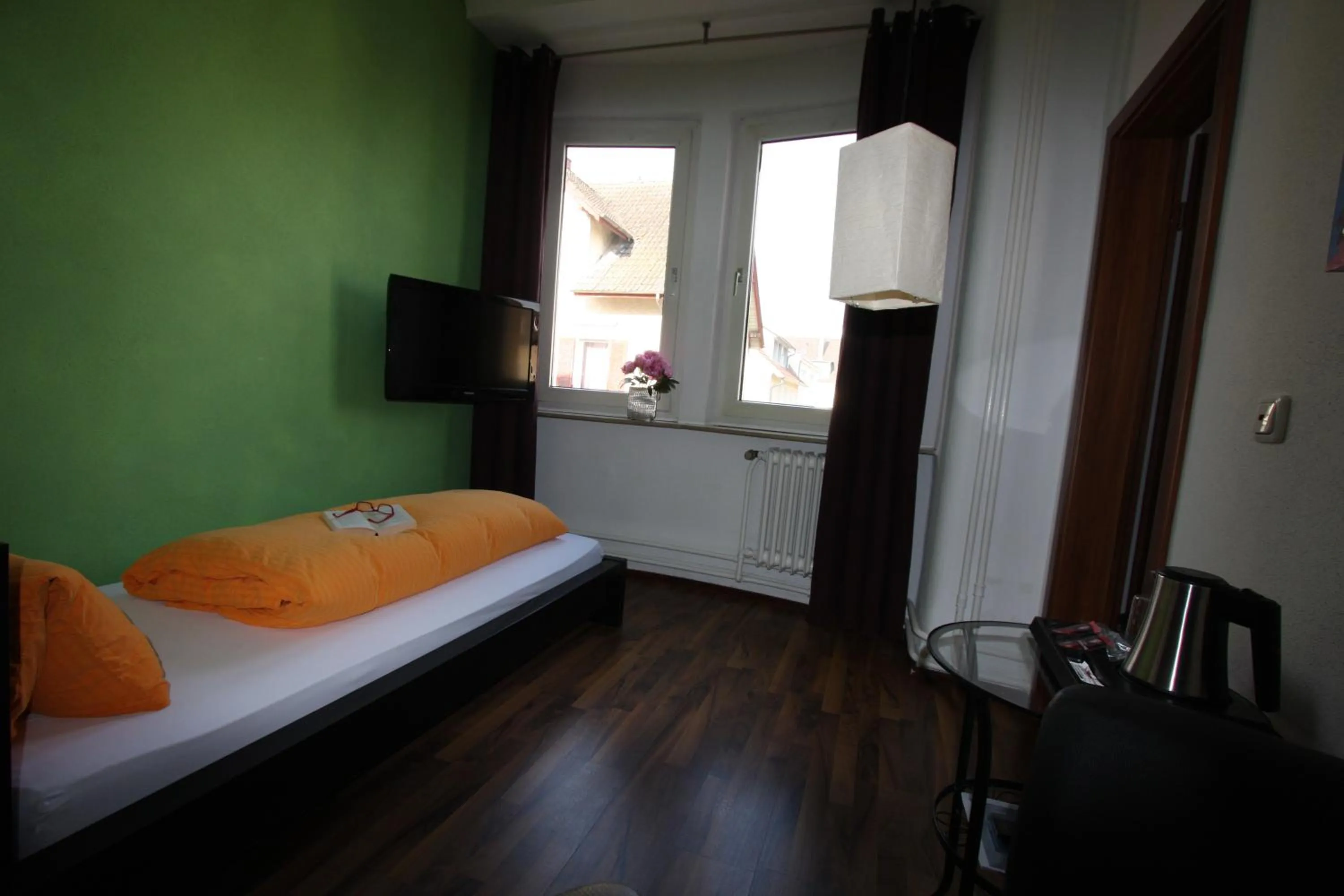 Photo of the whole room, Bed in Stadthotel Kleiner Berg