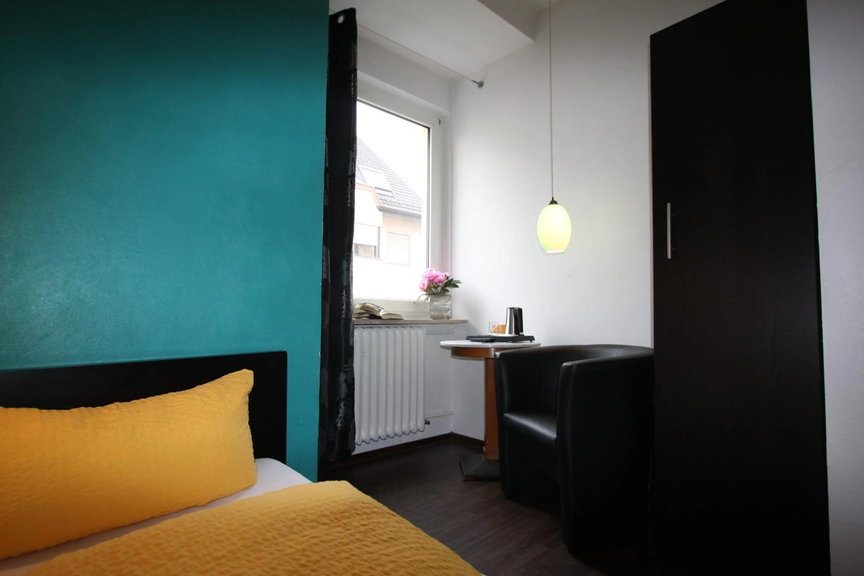 Photo of the whole room, Bed in Stadthotel Kleiner Berg