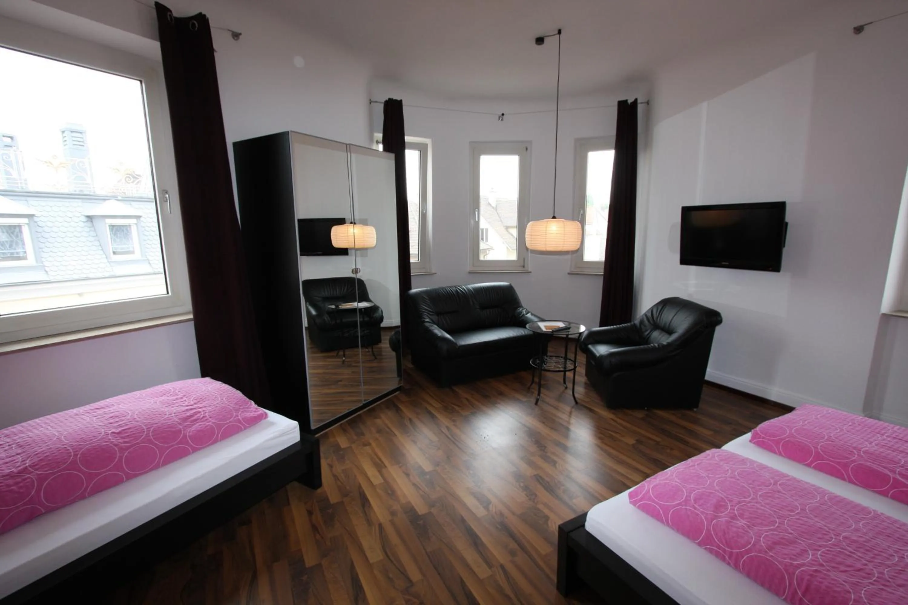 Photo of the whole room, Bed in Stadthotel Kleiner Berg