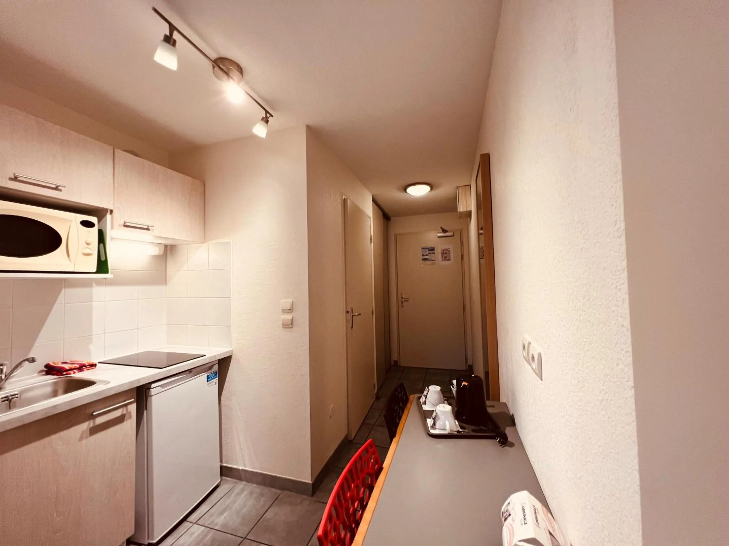 Kitchen or kitchenette in The Originals Boutique, Hôtel Le Cap, Gap Sud