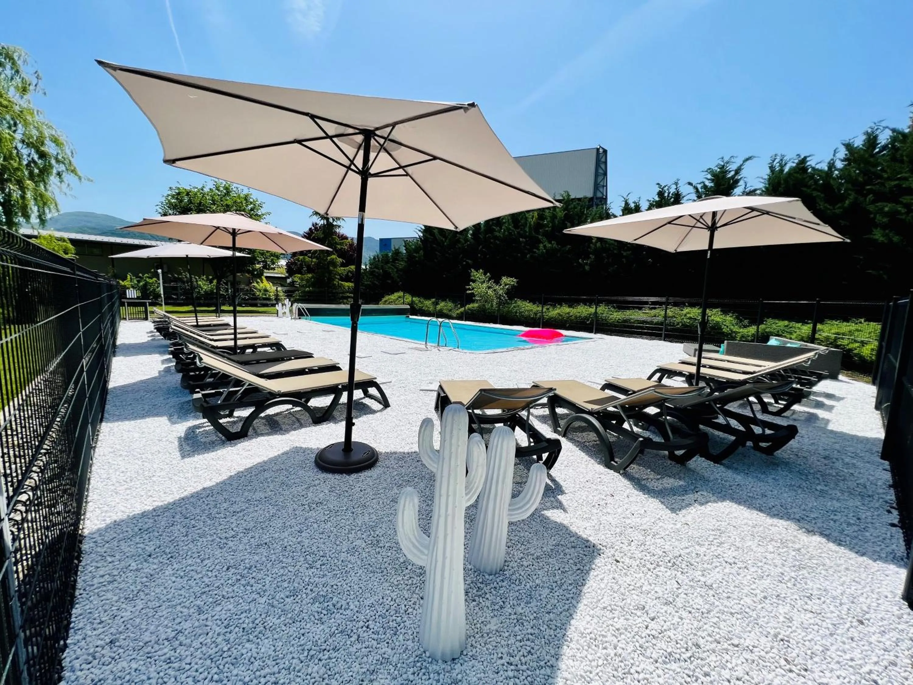 Swimming pool in The Originals Boutique, Hôtel Le Cap, Gap Sud