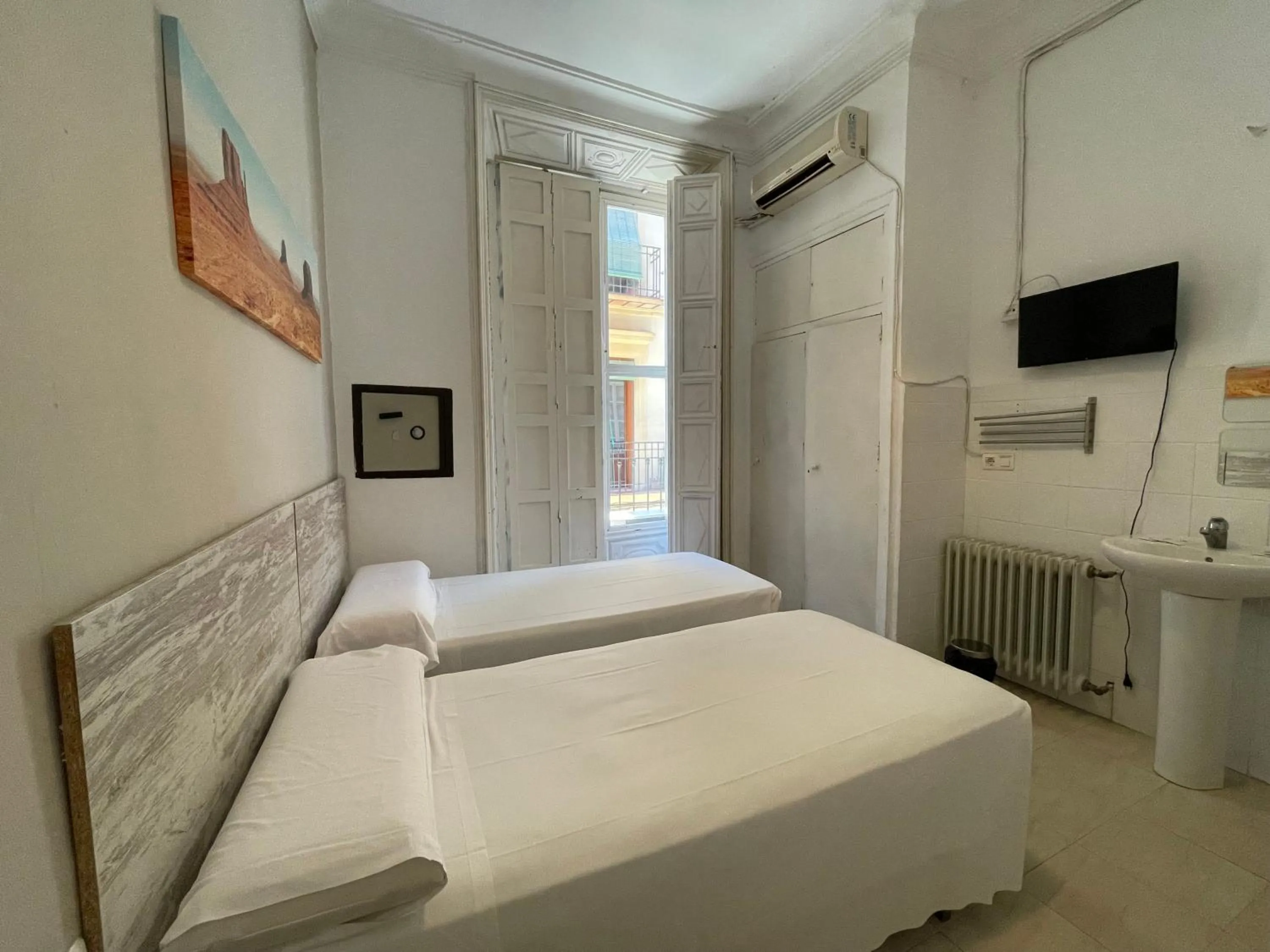 Bed in Pensión Duquesa Bed & Breakfast