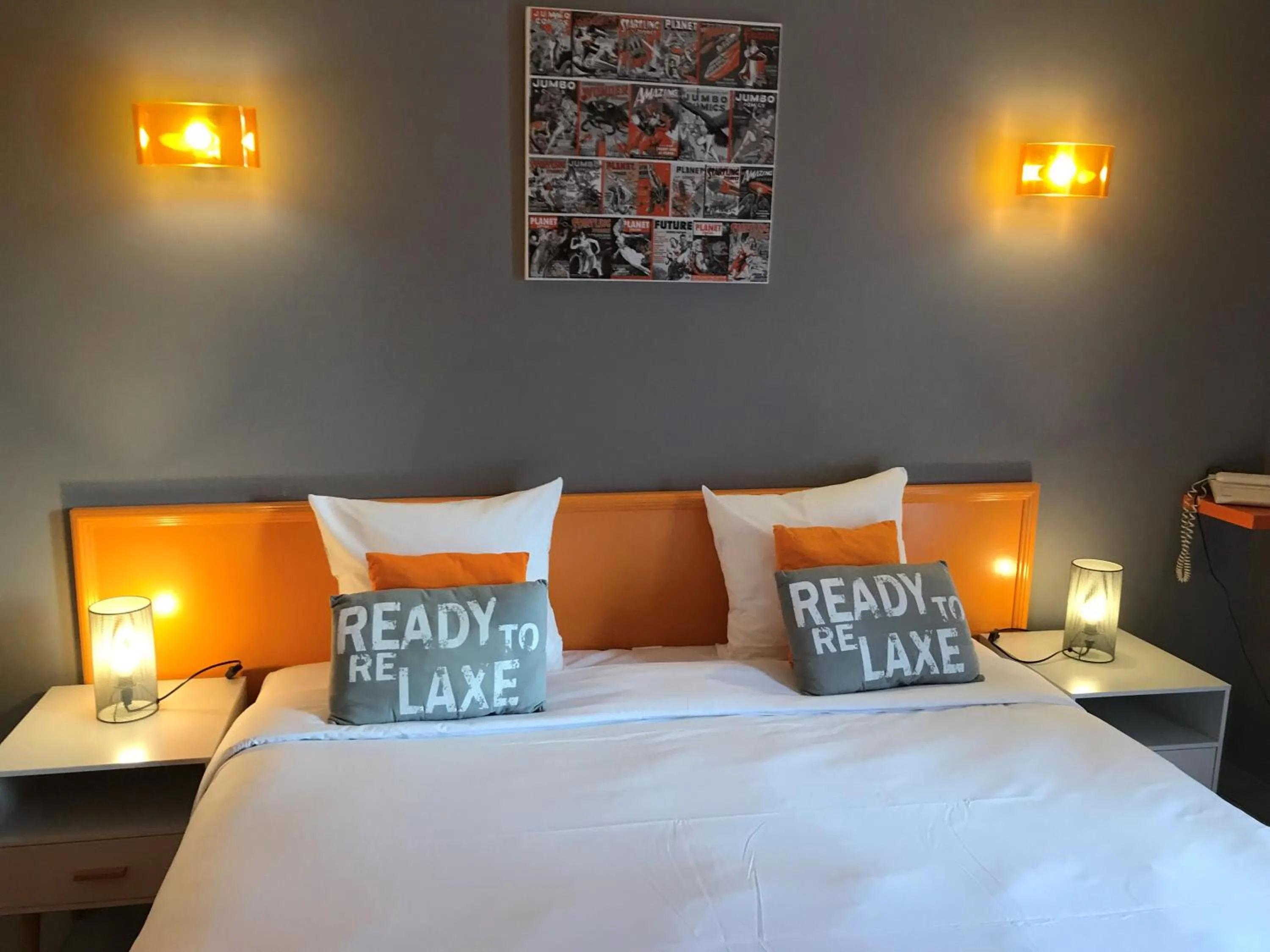 Bed in Logis Hotel Le Nuage