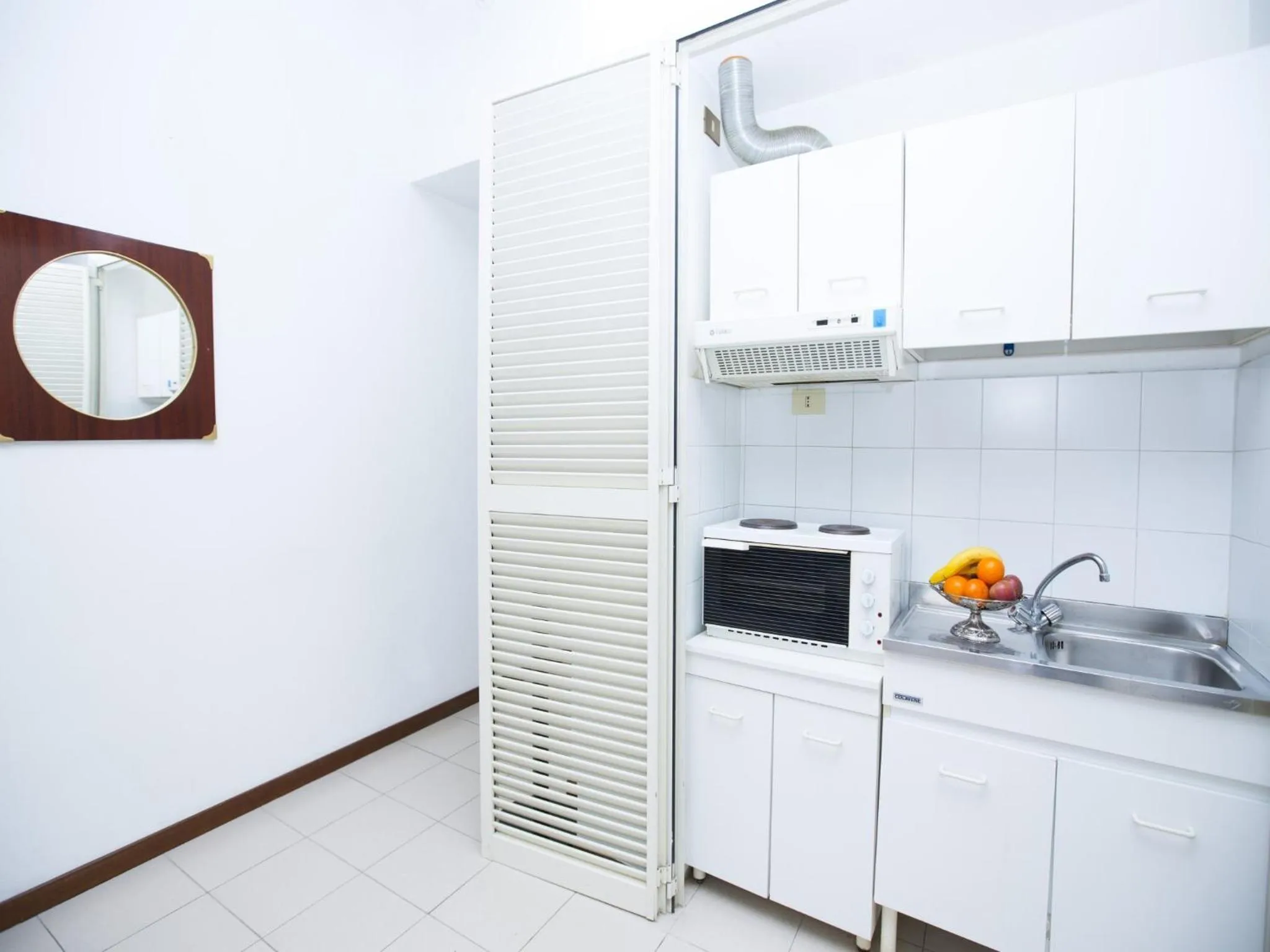 Kitchen or kitchenette in Hotel Residence Villa Tassoni