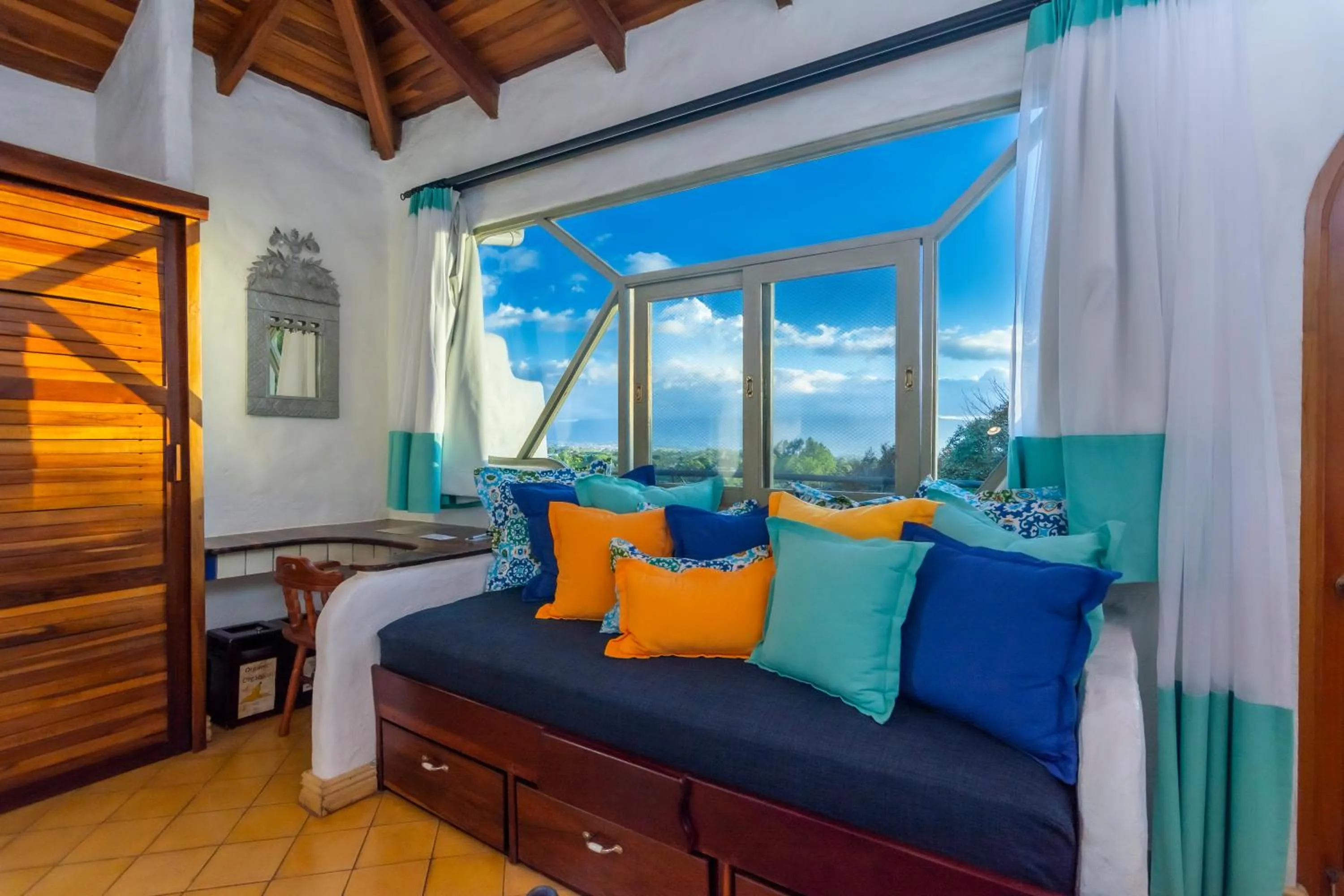 Living room, Bed in Finca Rosa Blanca Coffee Farm and Inn