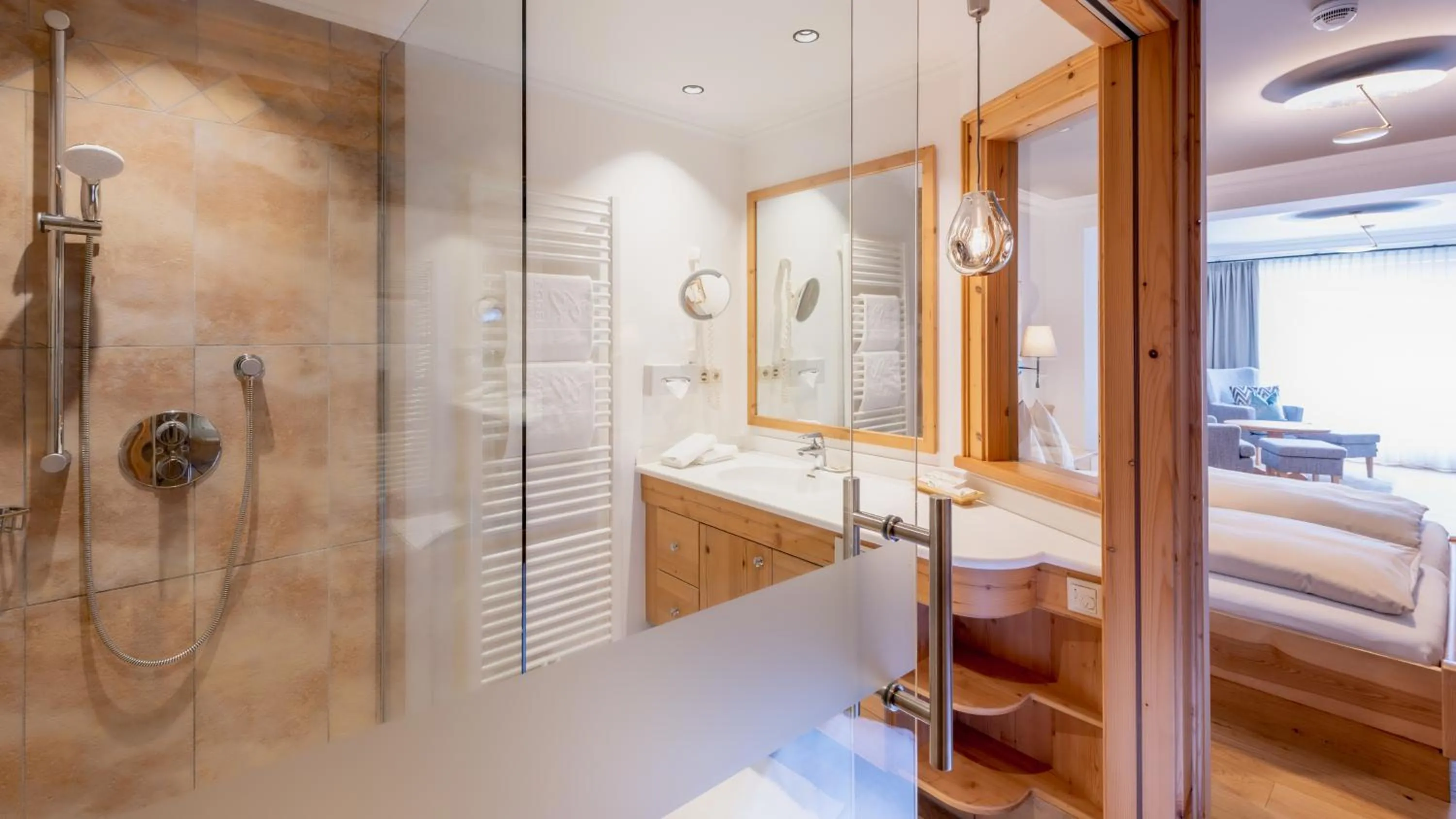 Bathroom, Bed in Wellnesshotel Eggerwirt