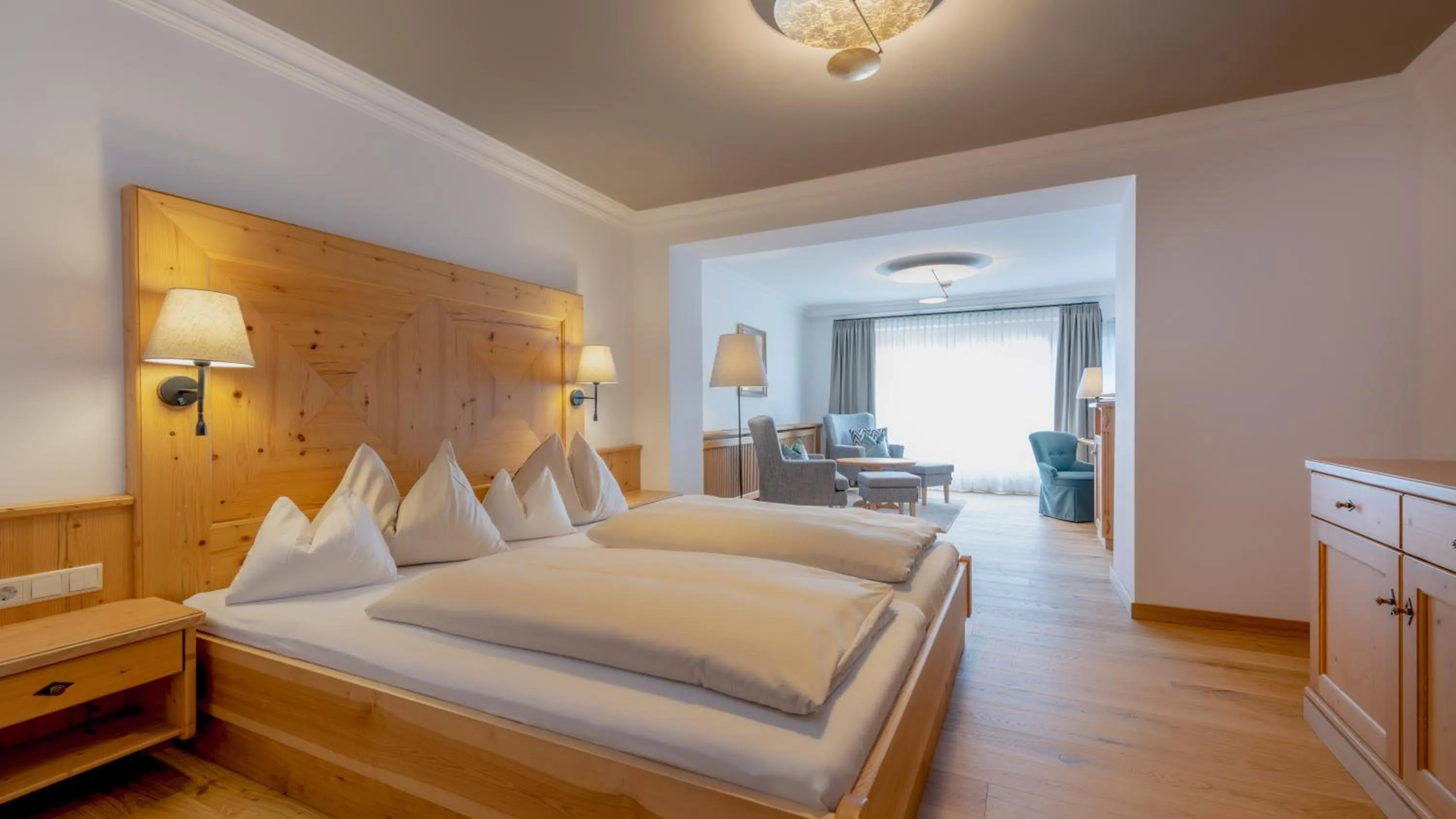 Seating area, Bed in Wellnesshotel Eggerwirt