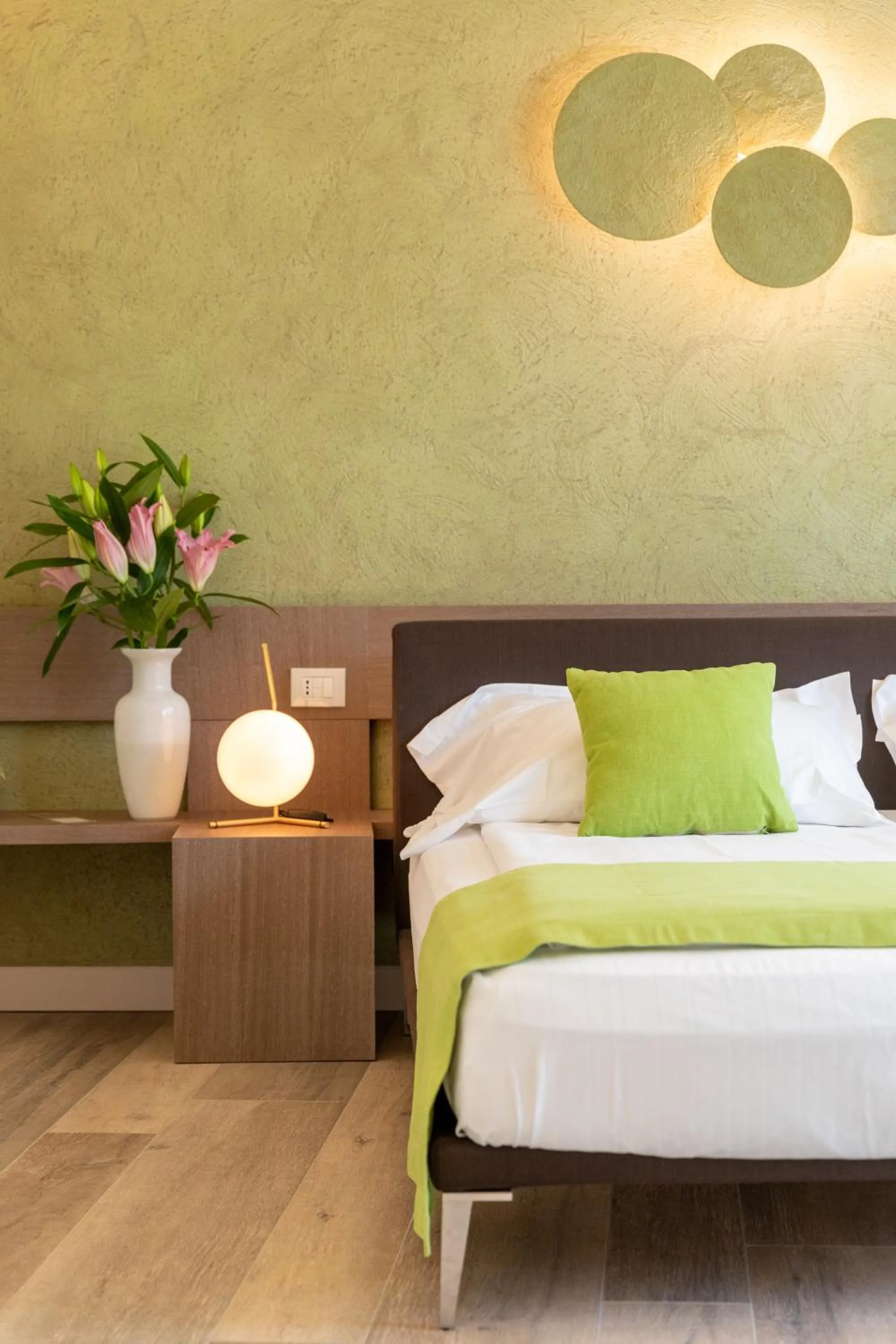 Bed in San Colombano Suites