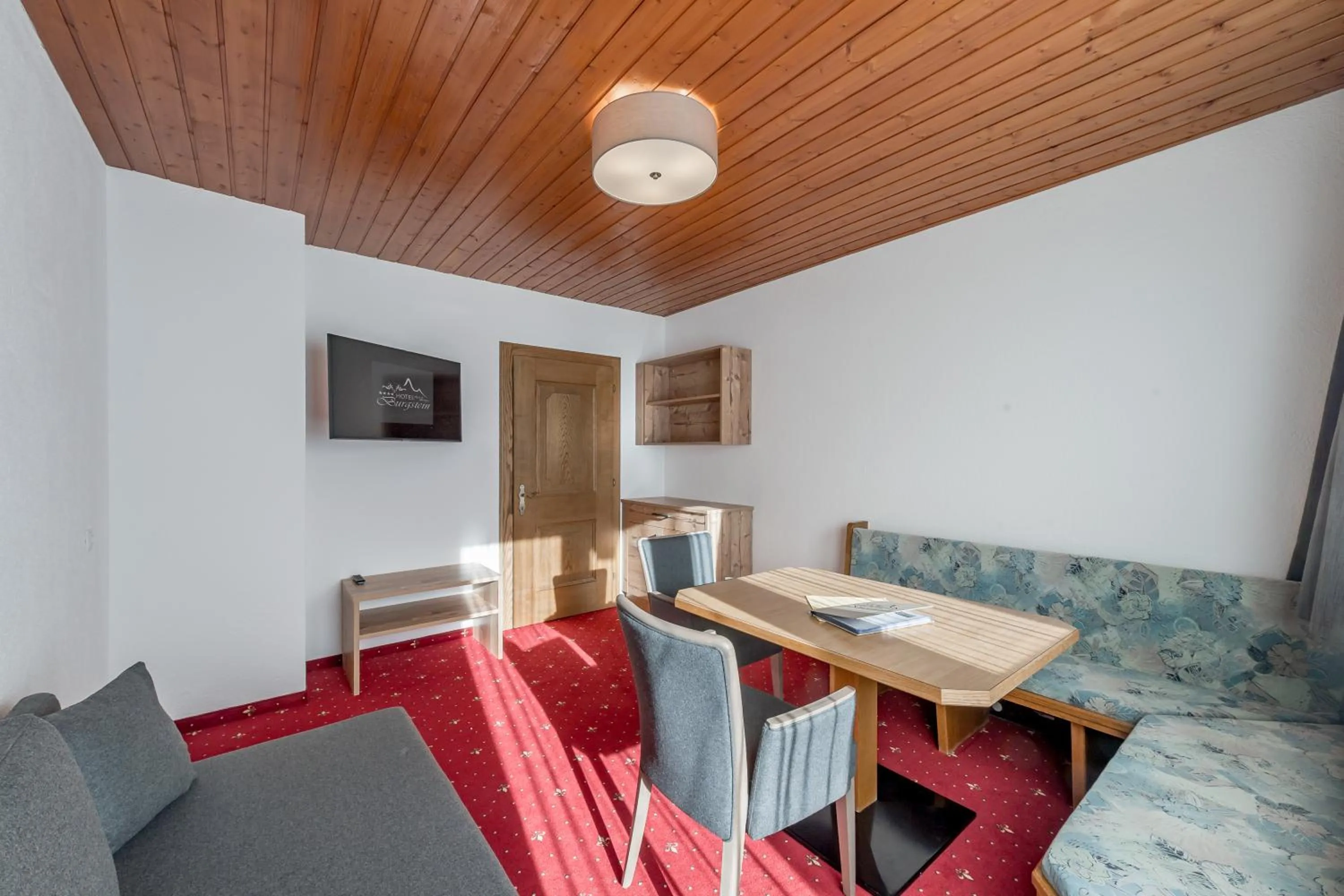 Photo of the whole room in Hotel Burgstein - alpin & lifestyle