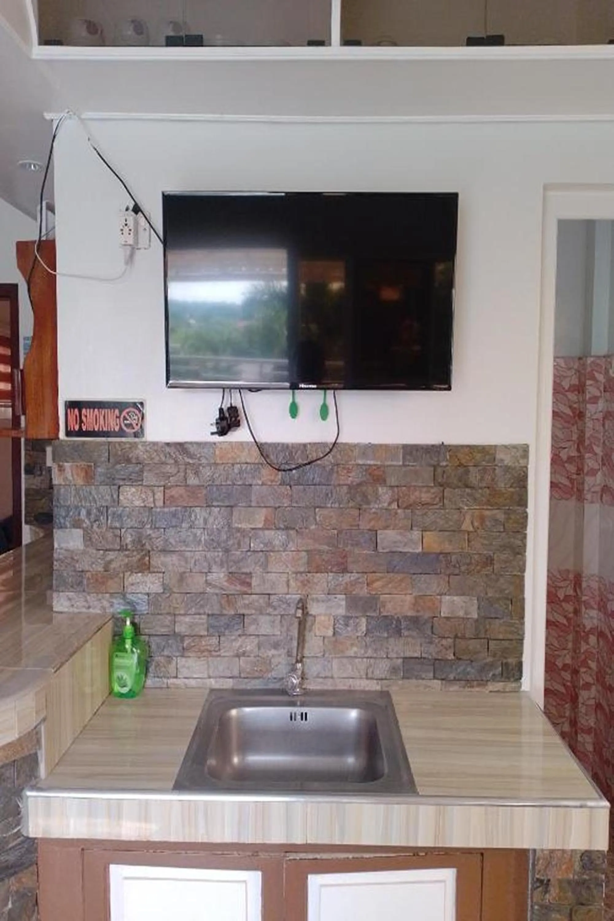 Kitchen or kitchenette in FNT Transient House near Hundred Islands