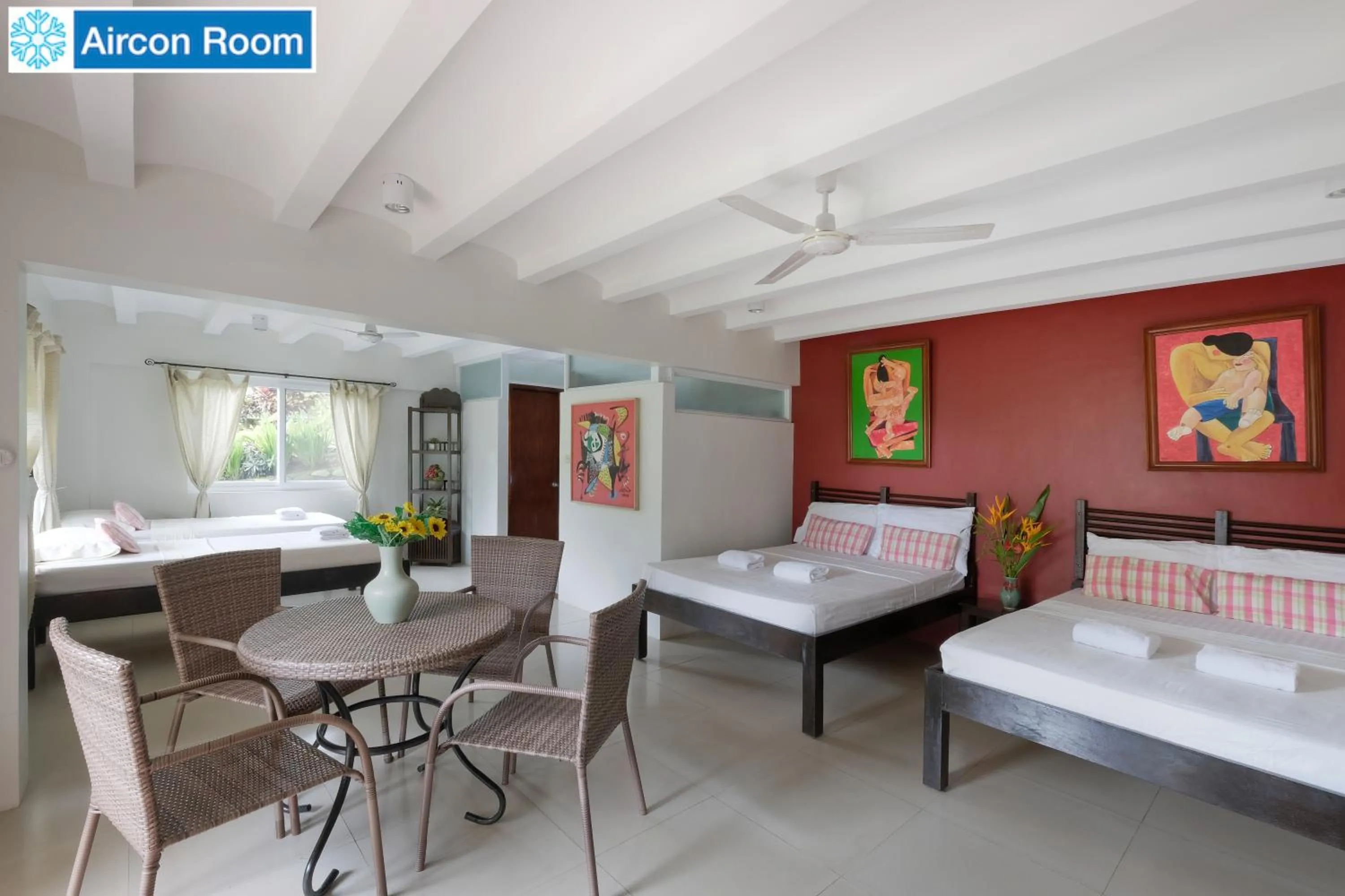 Bed in The Duyan House at Sinagtala Resort