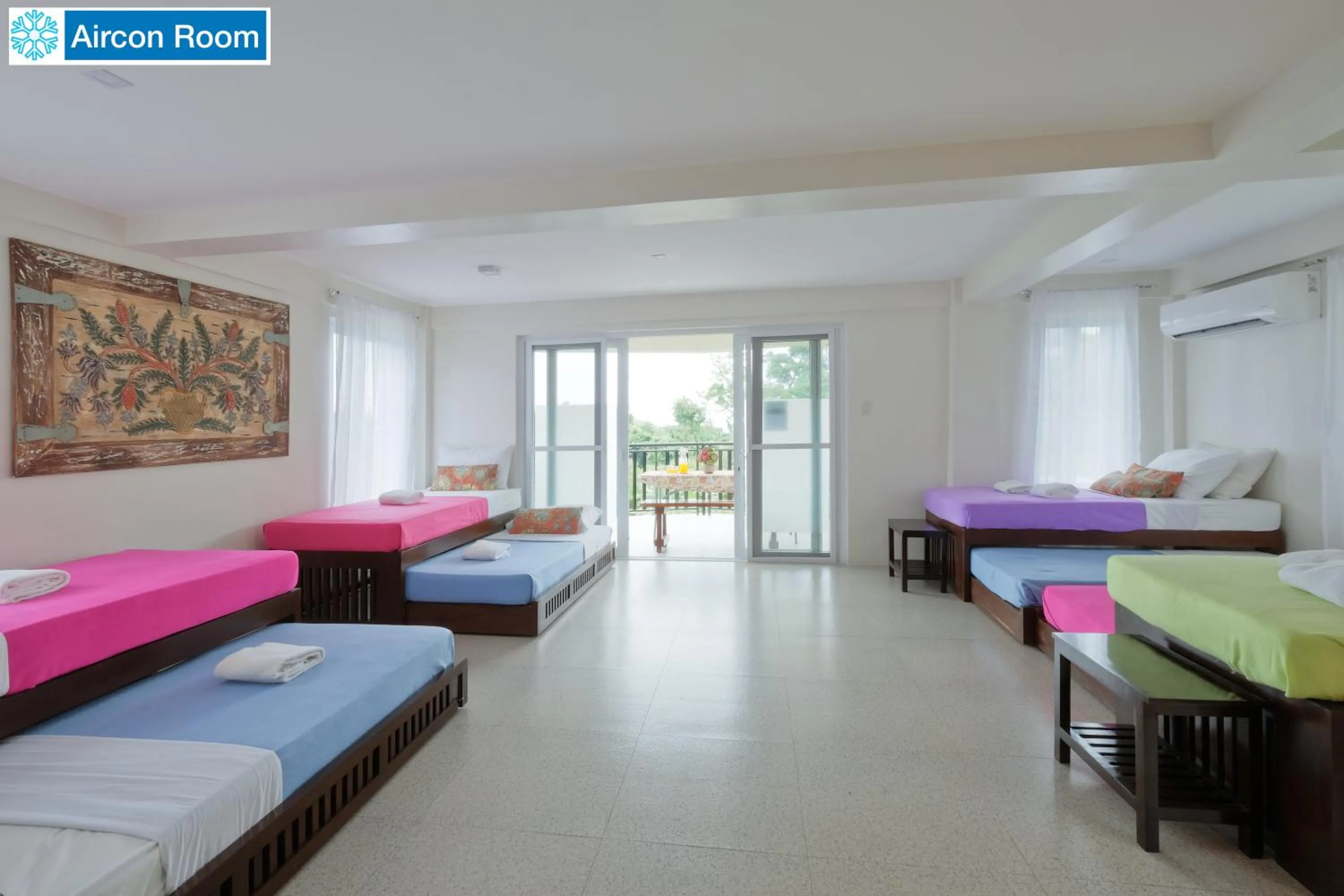 Bed in The Duyan House at Sinagtala Resort