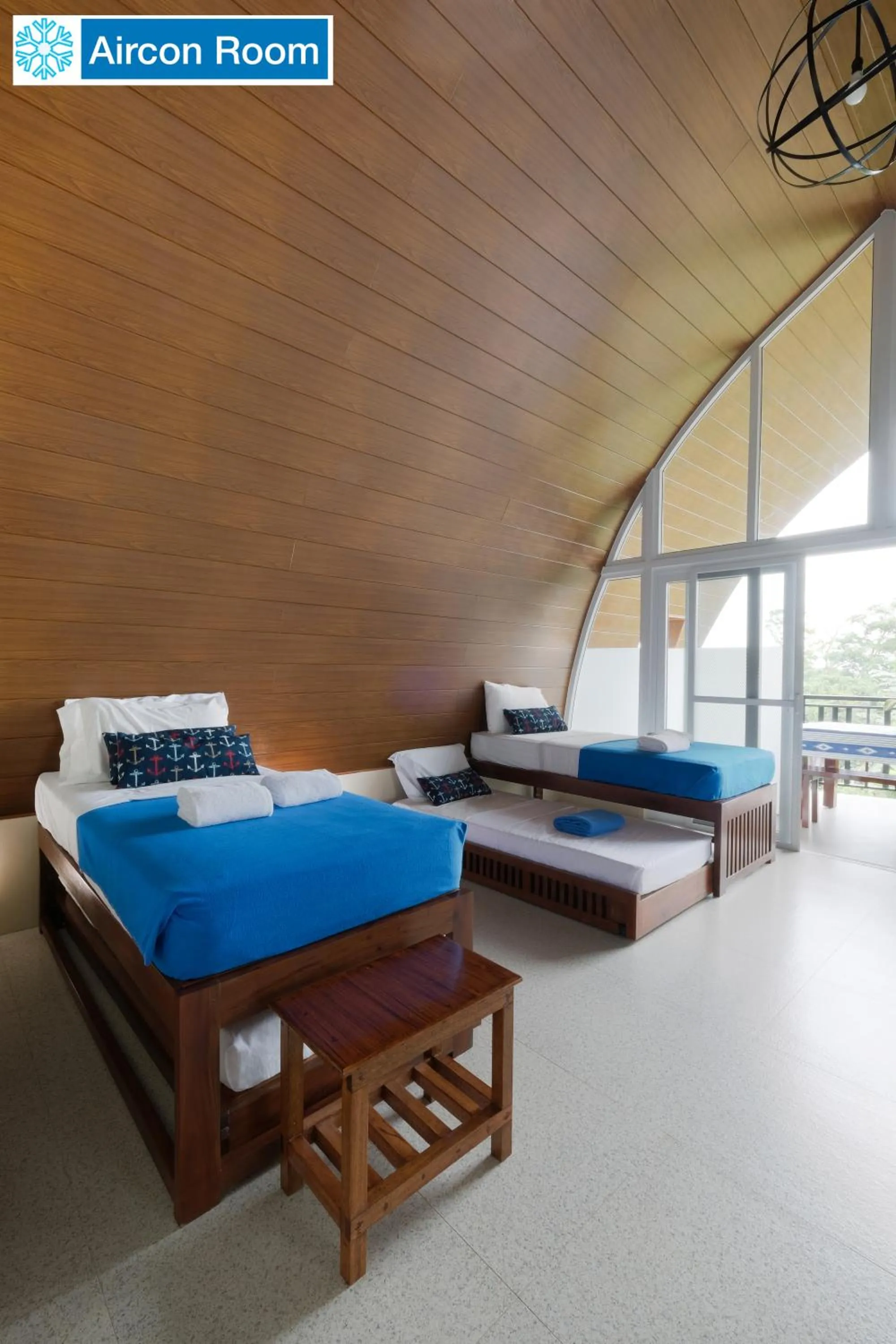 Bed in The Duyan House at Sinagtala Resort