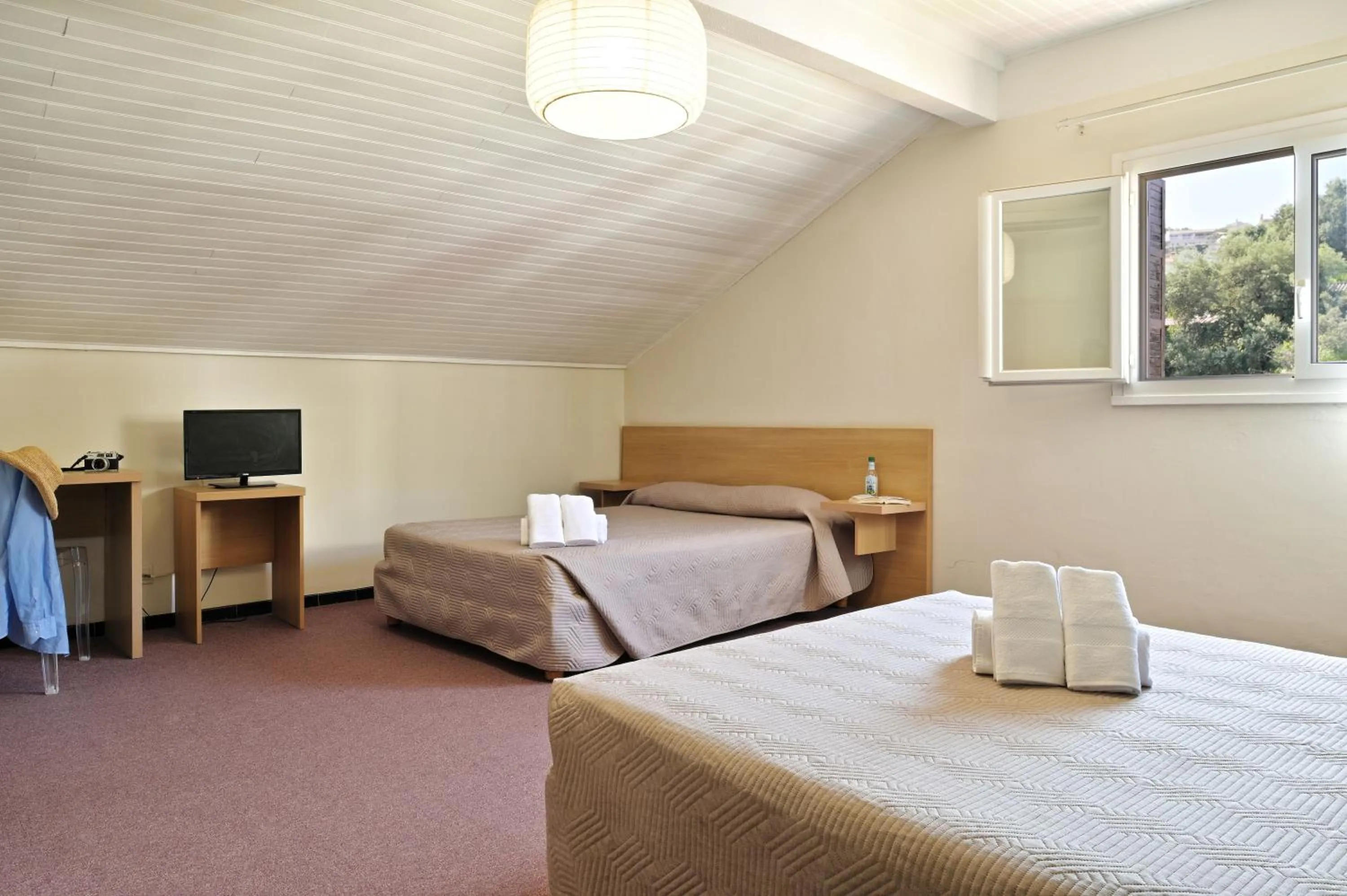 Bed in Hôtel de Porticcio