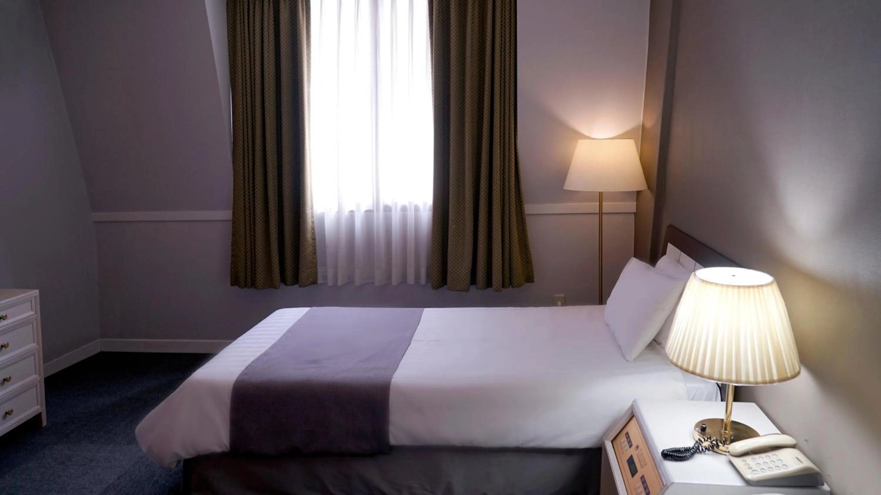 Bed in Pearl Hotel Jeju