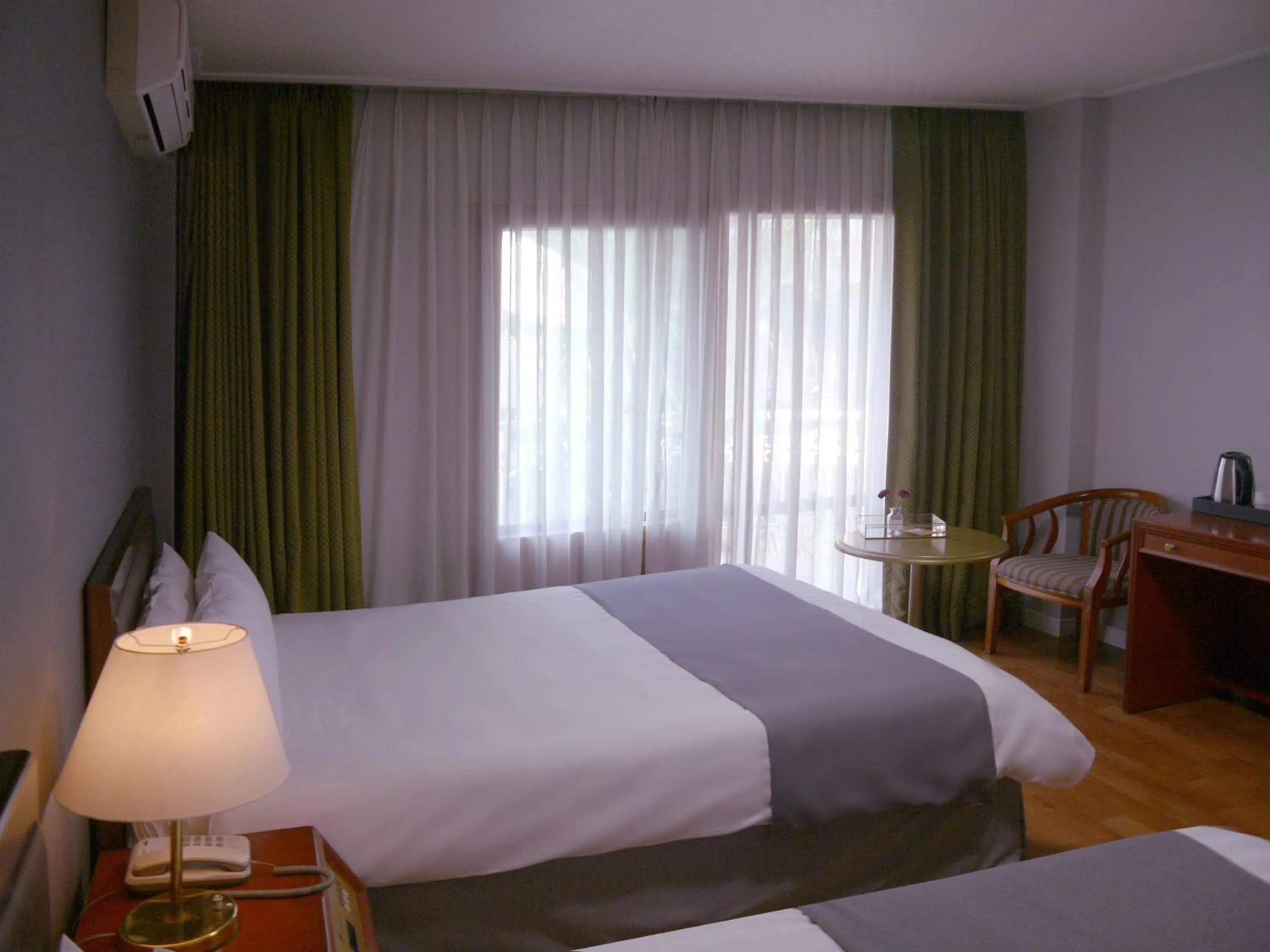 Bed in Pearl Hotel Jeju