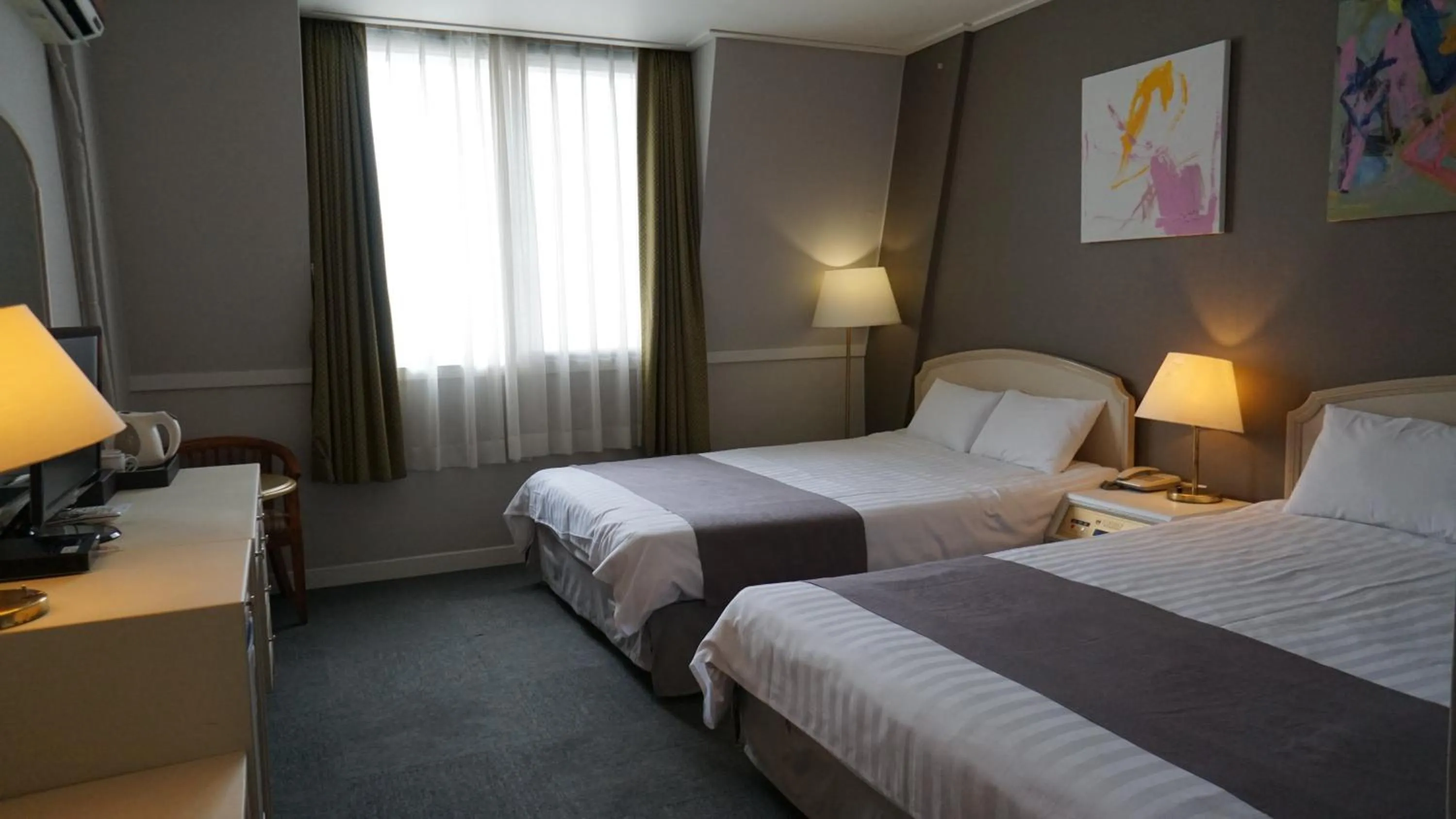 Bed in Pearl Hotel Jeju