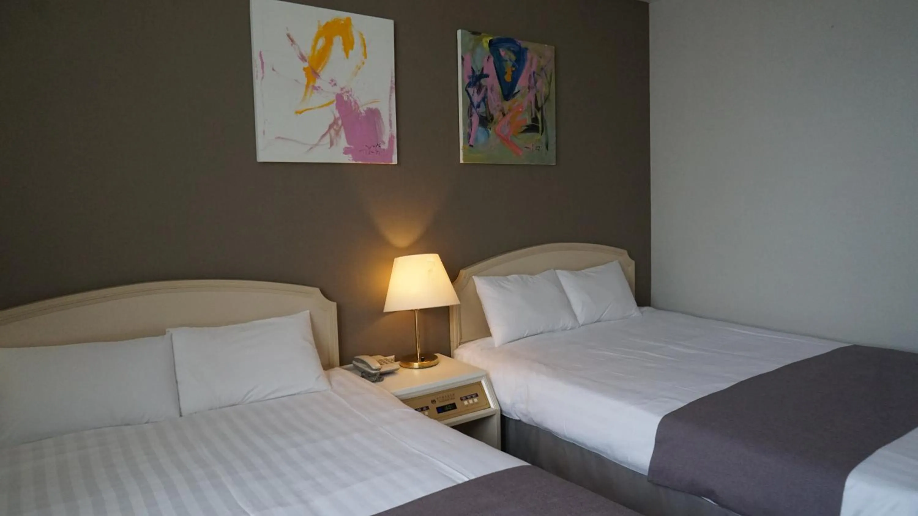 Bed in Pearl Hotel Jeju