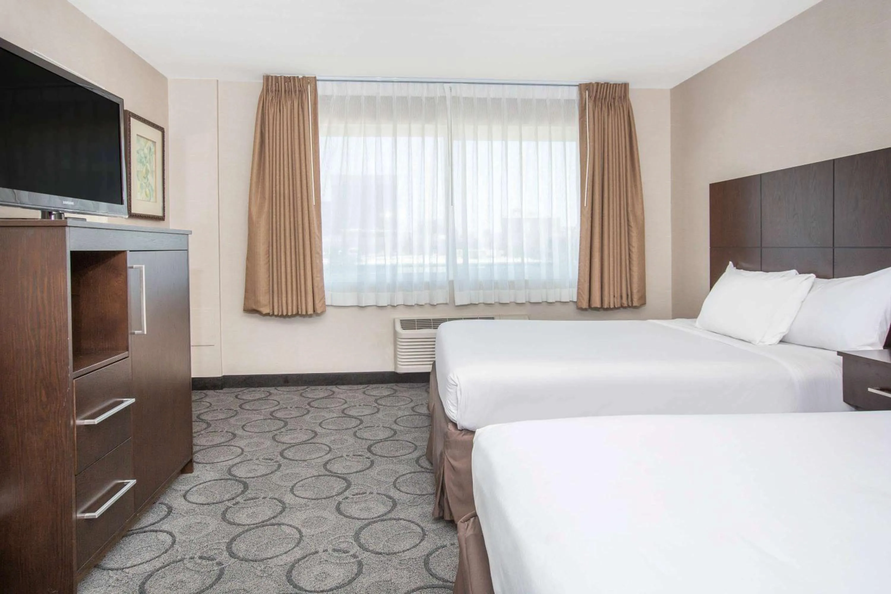 Photo of the whole room, Bed in Baymont by Wyndham San Diego Downtown