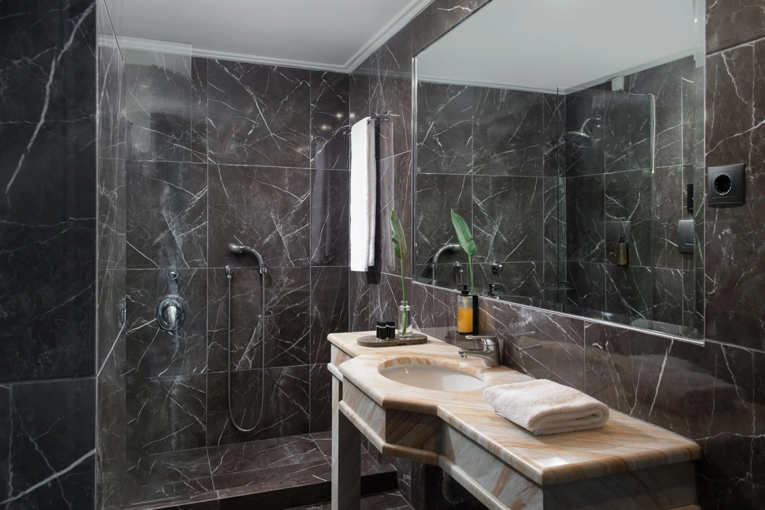 Bathroom in Athenian Riviera Hotel& Suites