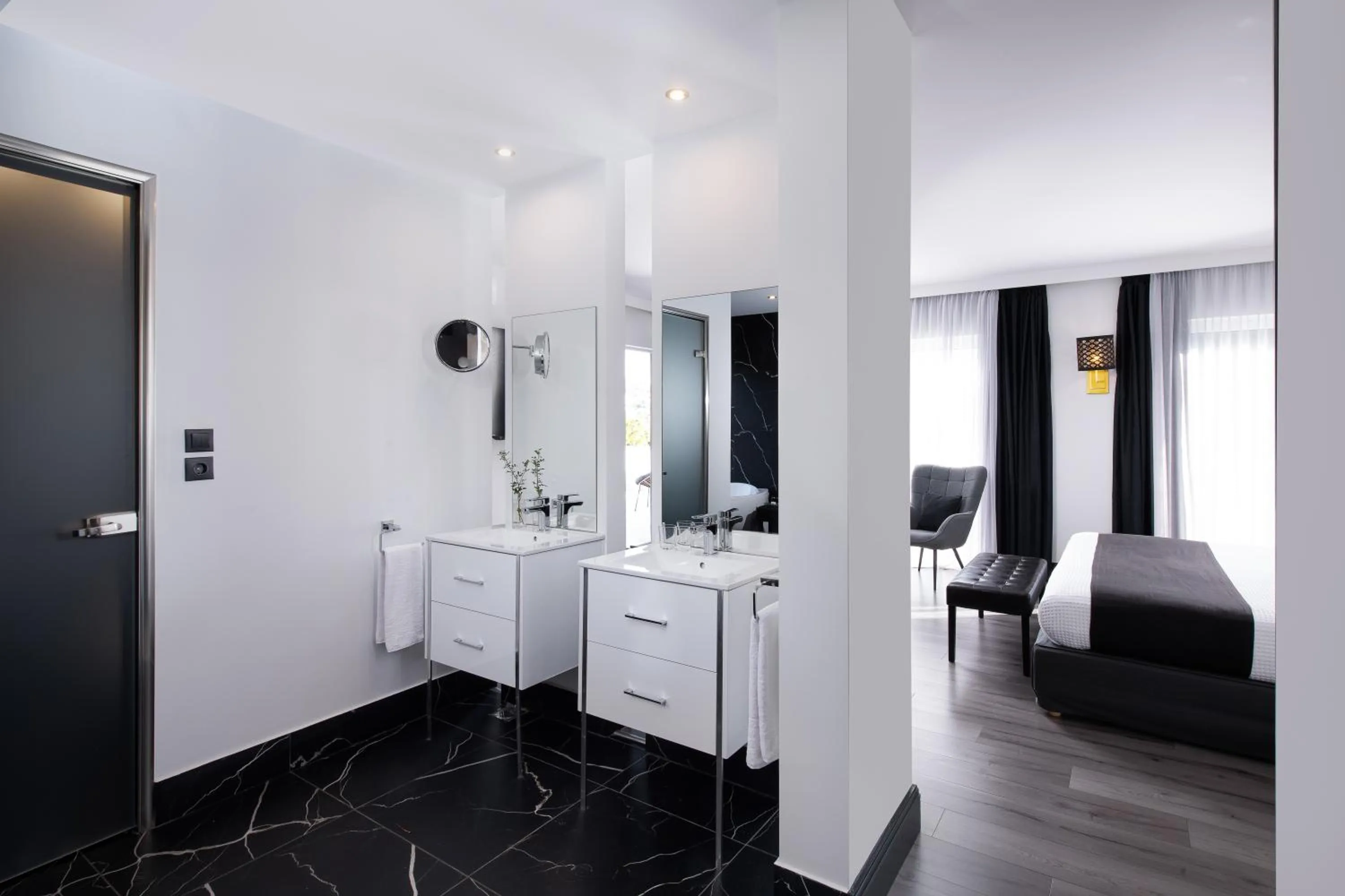 Bathroom in Athenian Riviera Hotel& Suites