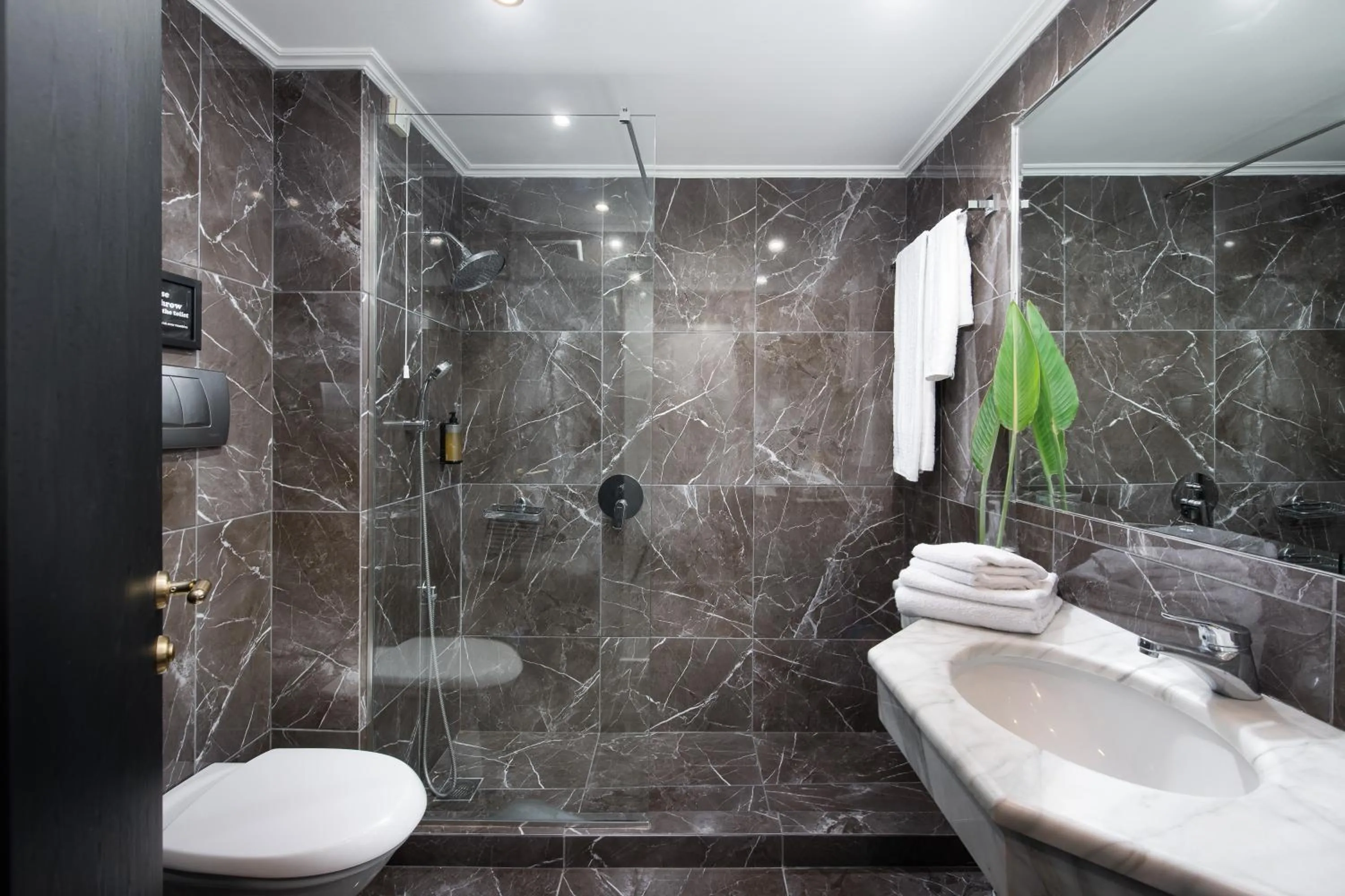 Shower in Athenian Riviera Hotel& Suites
