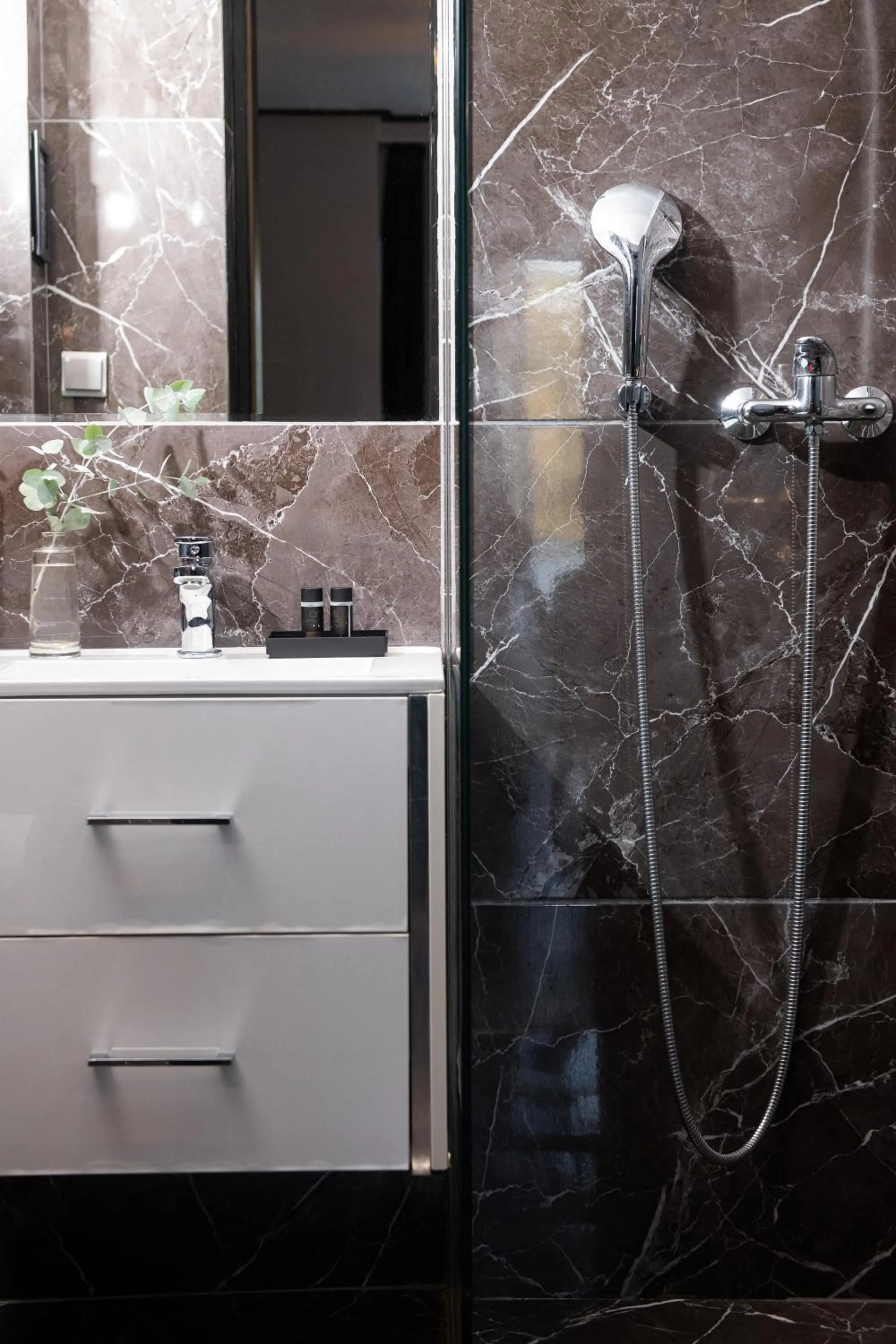 Bathroom in Athenian Riviera Hotel& Suites