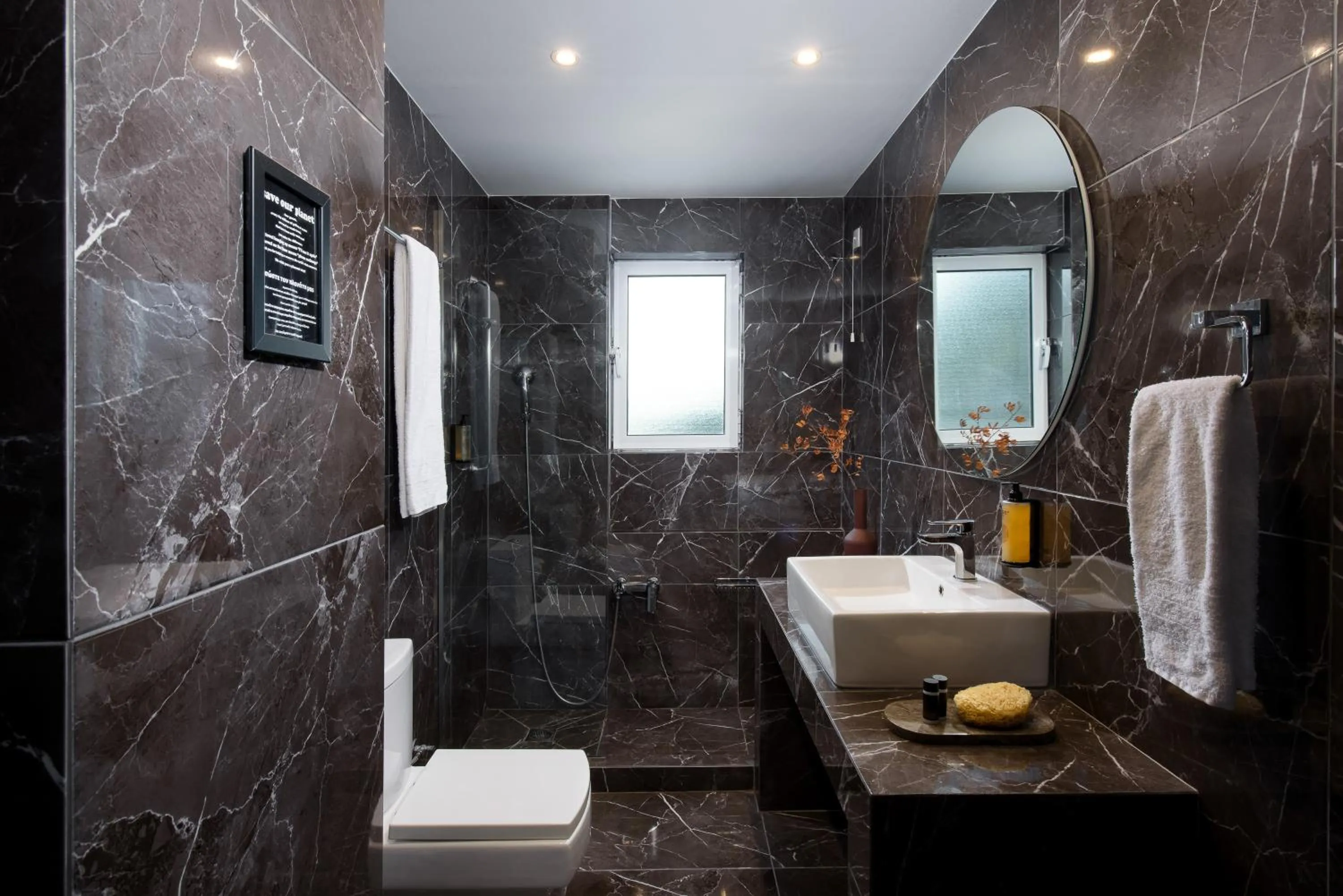 Bathroom in Athenian Riviera Hotel& Suites