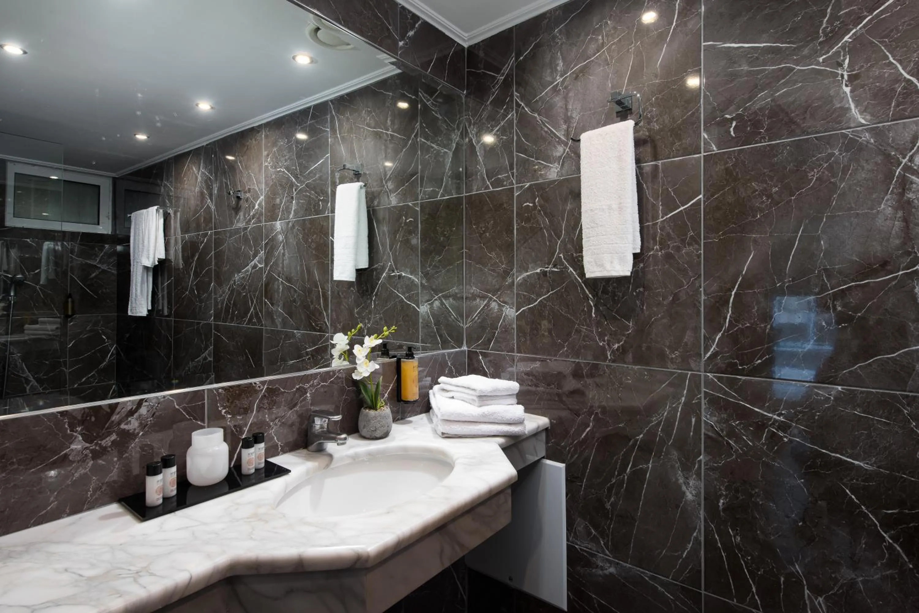 Bathroom in Athenian Riviera Hotel& Suites