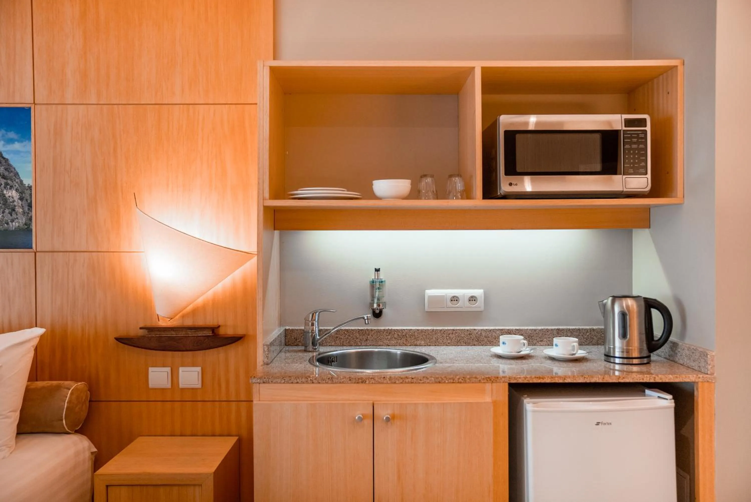 Coffee/tea facilities in Hôtel Le Lagon