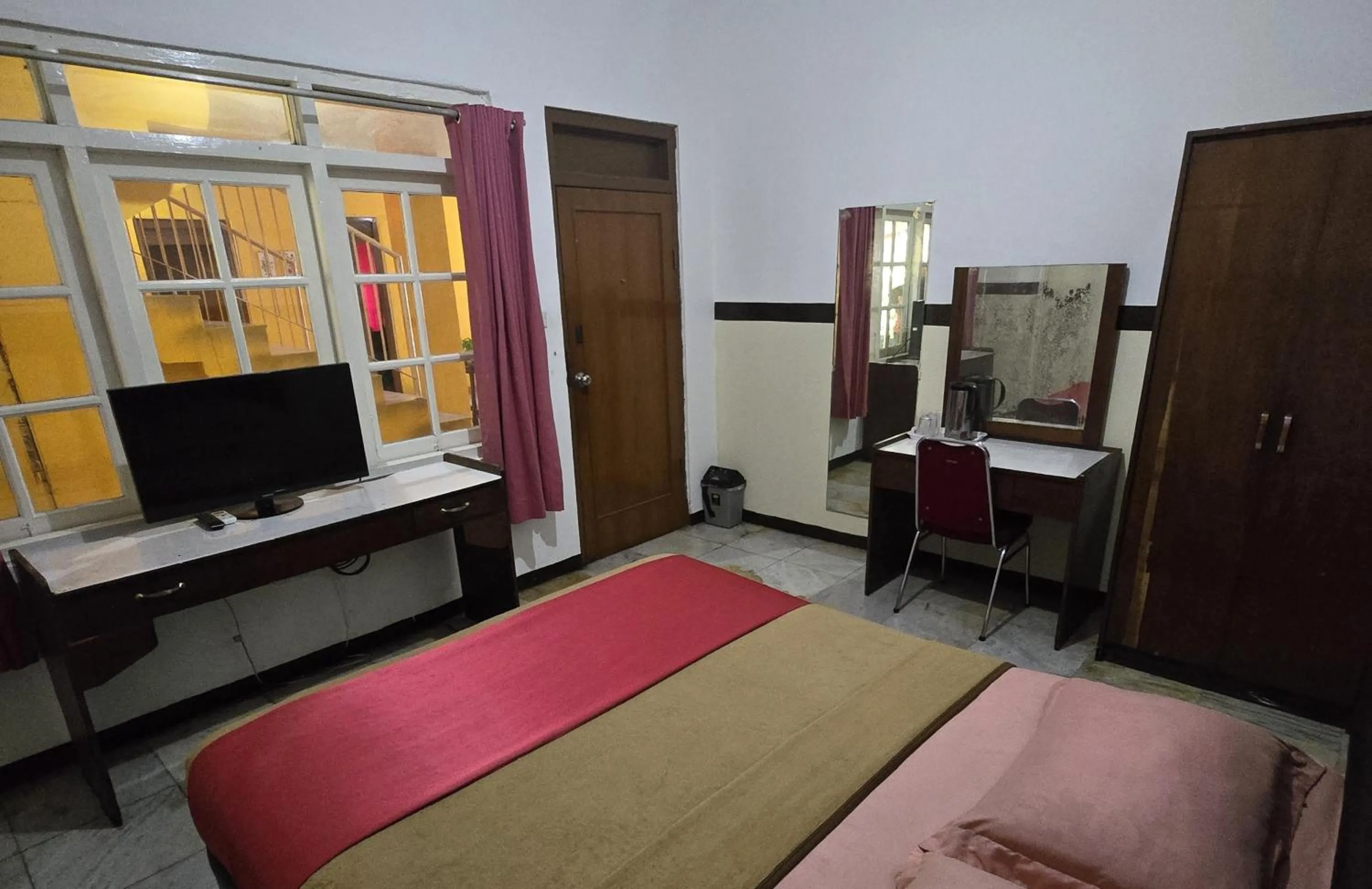 Bed in Hotel Tugu Asri