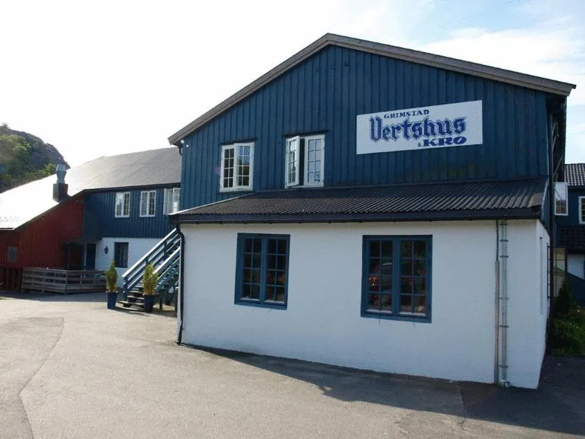 Property building in Grimstad Vertshus