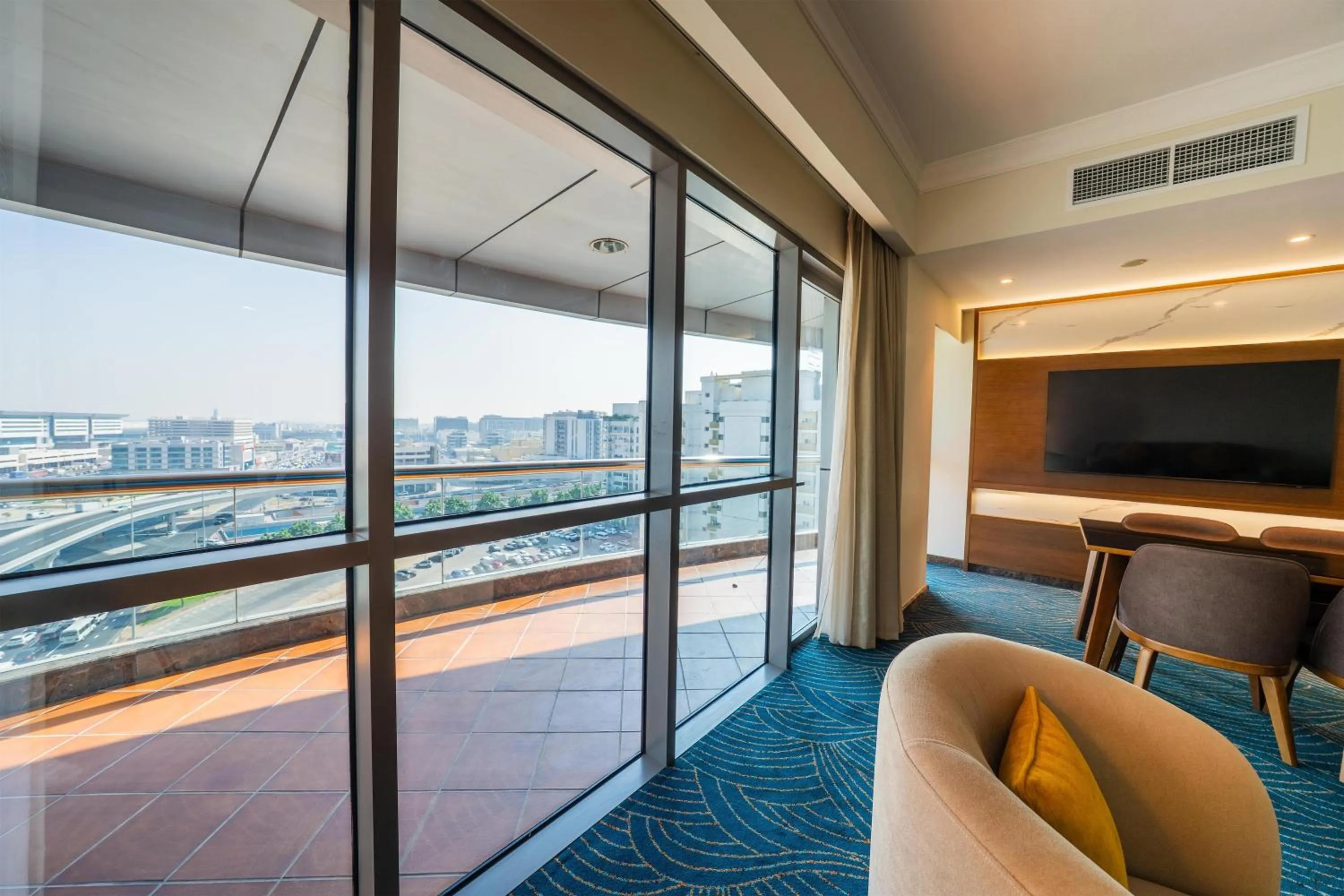 Living room in DoubleTree by Hilton Dubai Port Saeed