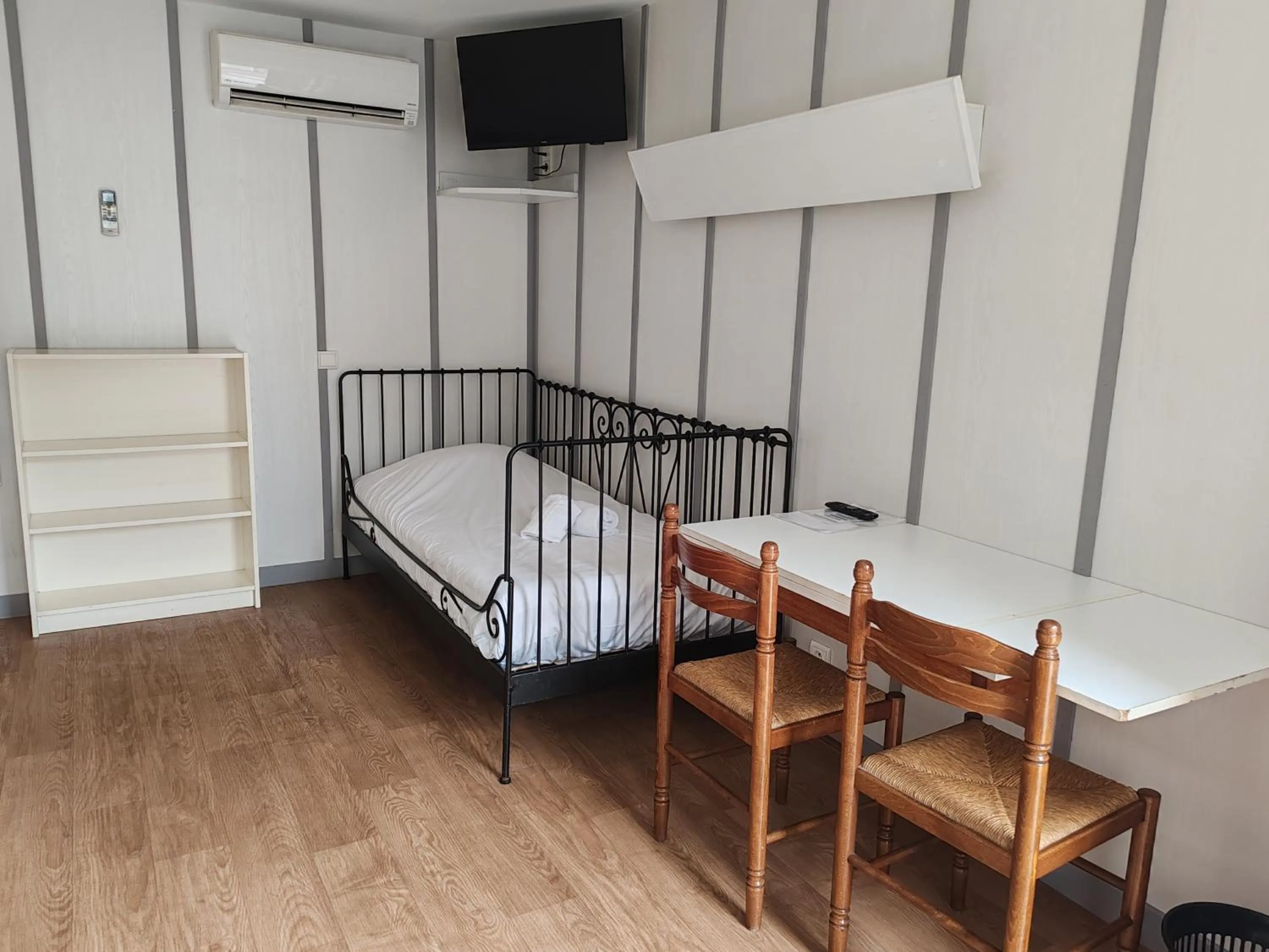 Bed in Hotel Marjolaine