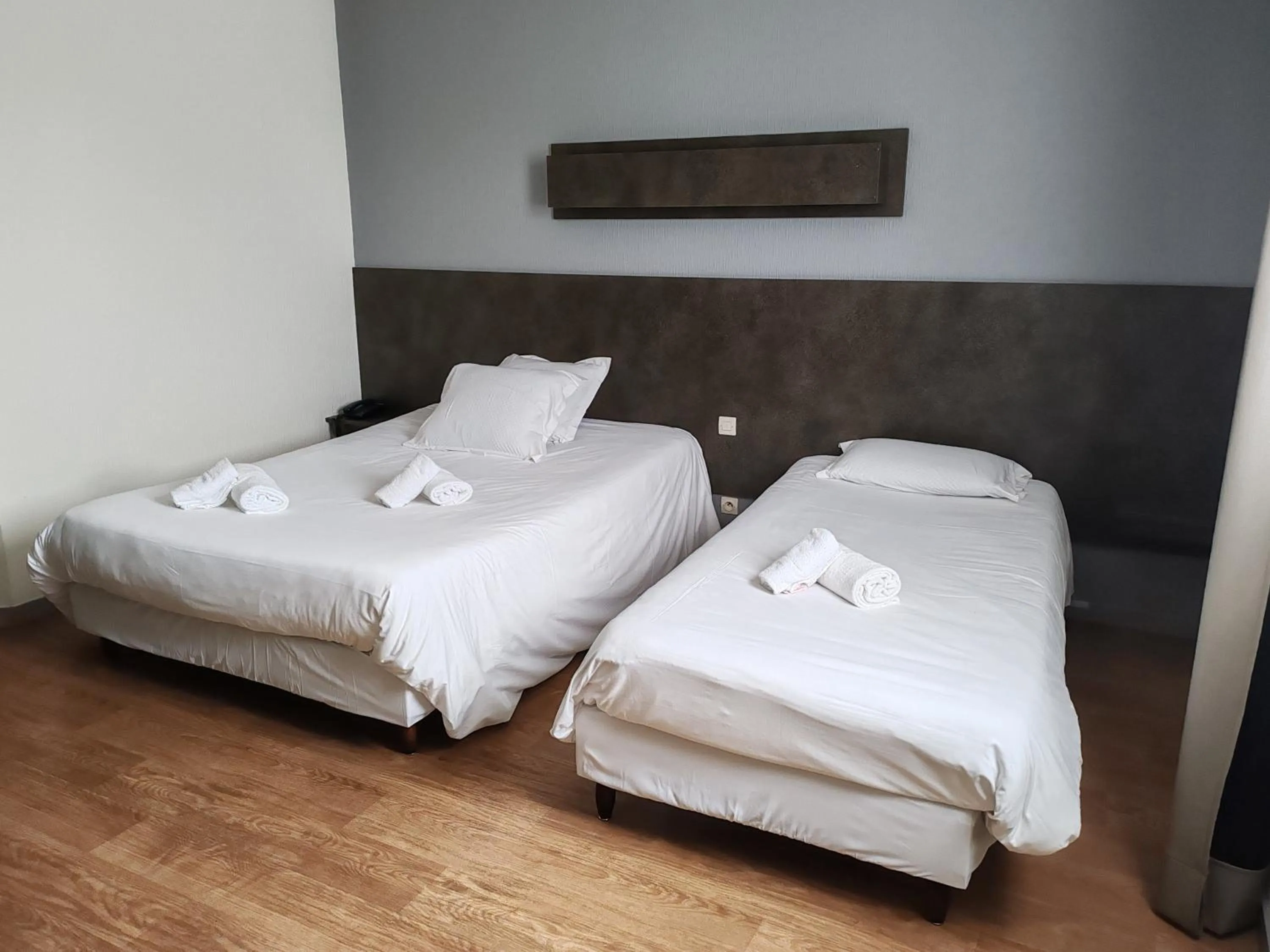 Bed in Hotel Marjolaine