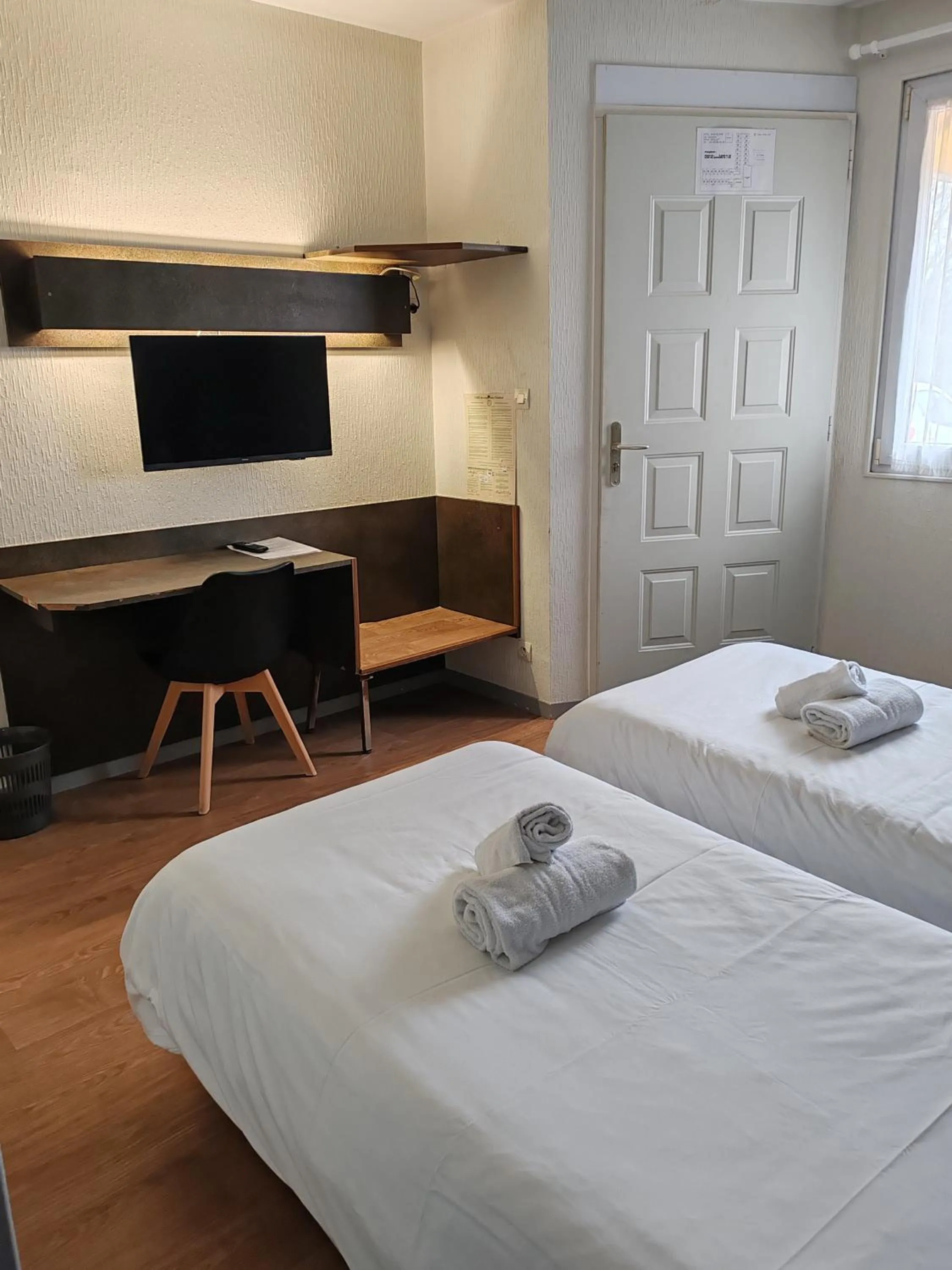 Bed in Hotel Marjolaine